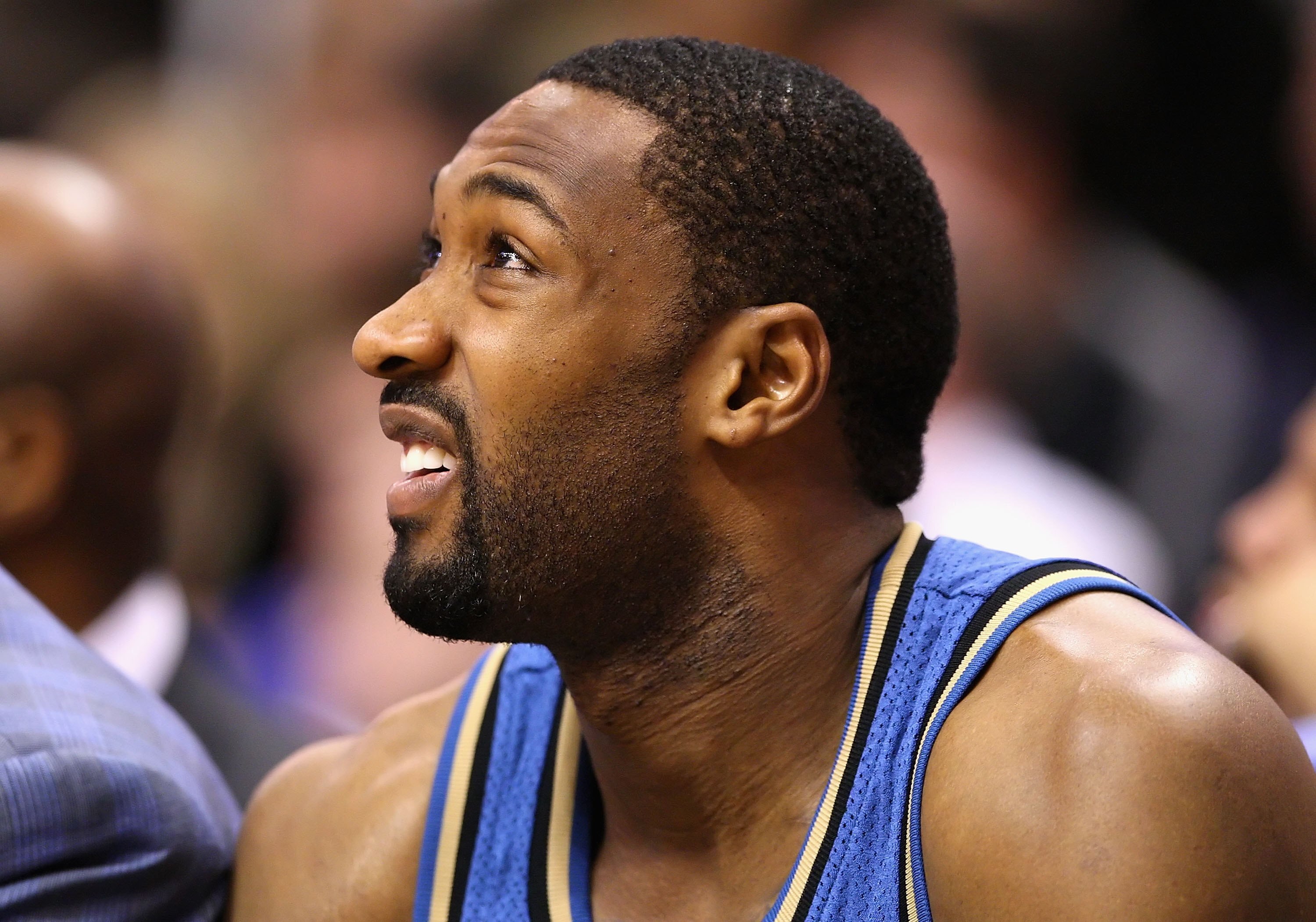 PHOENIX - DECEMBER 19:  Gilbert Arenas #0 of the Washington Wizards sits on the bench during the NBA game against the Phoenix Suns at US Airways Center on December 19, 2009 in Phoenix, Arizona. The Suns defeated the Wizards 121-95. NOTE TO USER: User expr