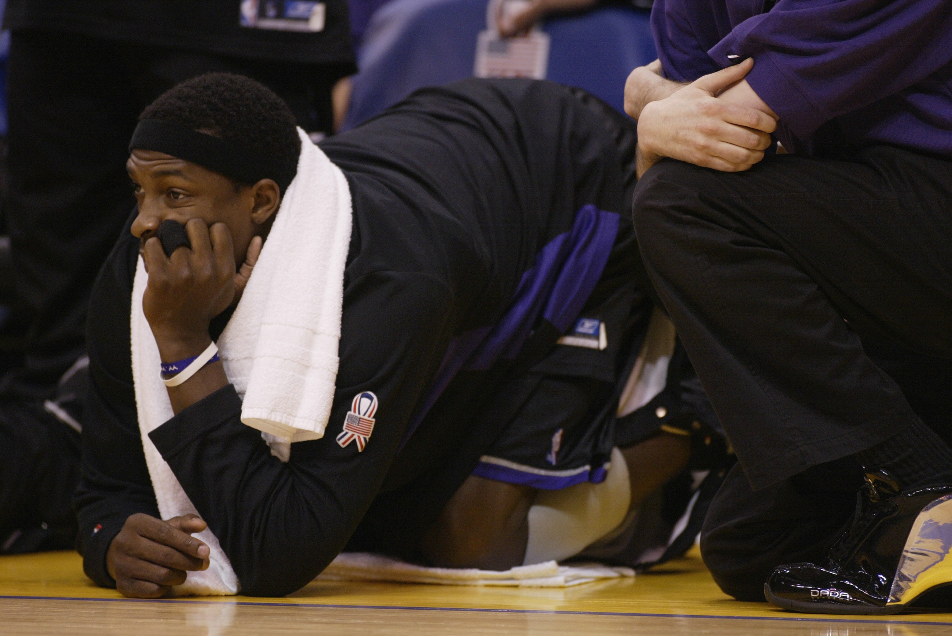LOS ANGELES - MAY 31:  Gerald Wallace #3 of the Sacramento Kings watches from the sideline during Game six of the Western Conference Finals during the 2002 NBA Playoffs against the Los Angeles Lakers on May 31, 2002 at Staples Center in Los Angeles, Calif