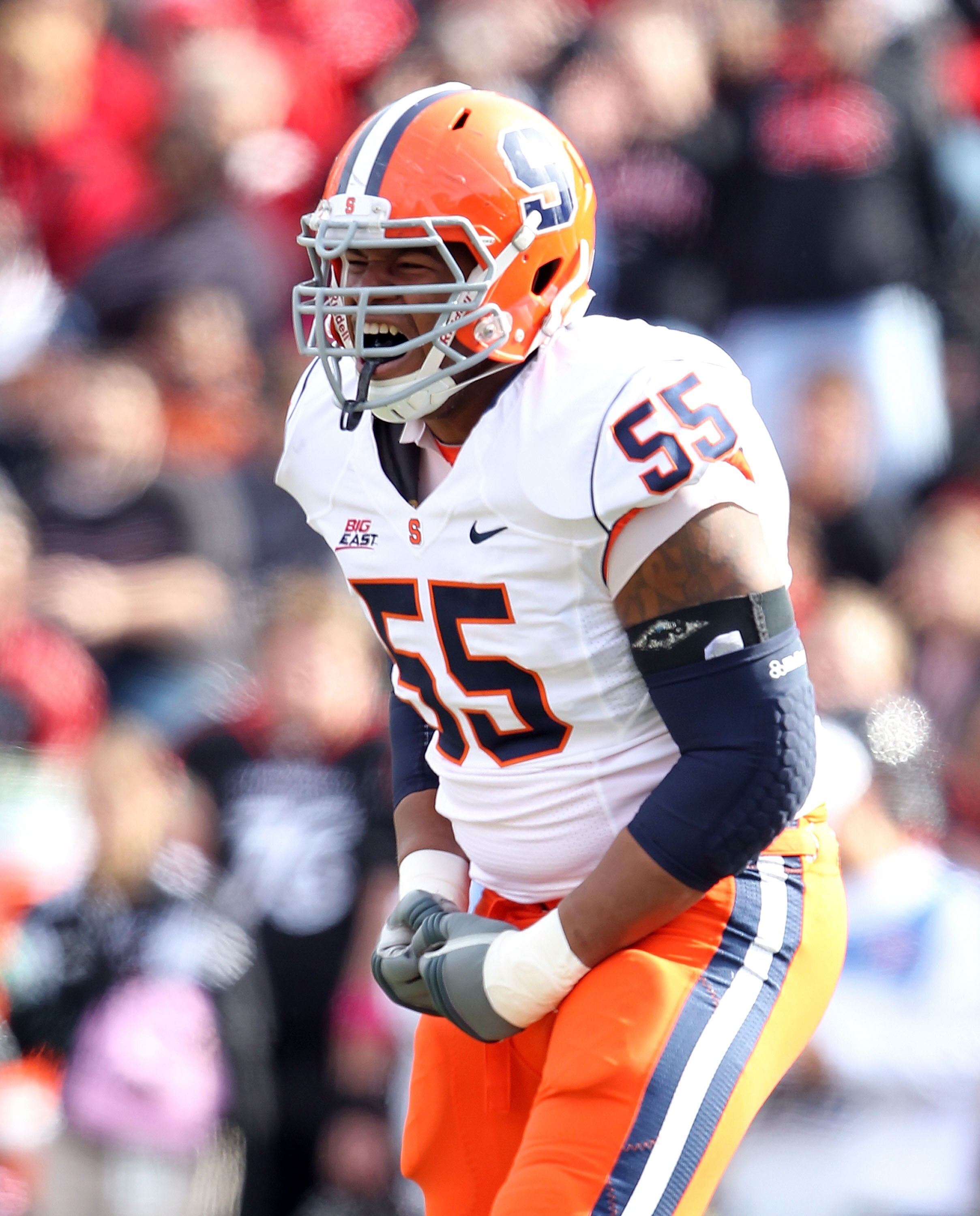 CINCINNATI - OCTOBER 30:  Anthony Perkins #55 of the Syracuse Orange celebrates during the Big East Conference game against the Cincinnati Bearcats at Nippert Stadium on October 30, 2010 in Cincinnati, Ohio.  (Photo by Andy Lyons/Getty Images)