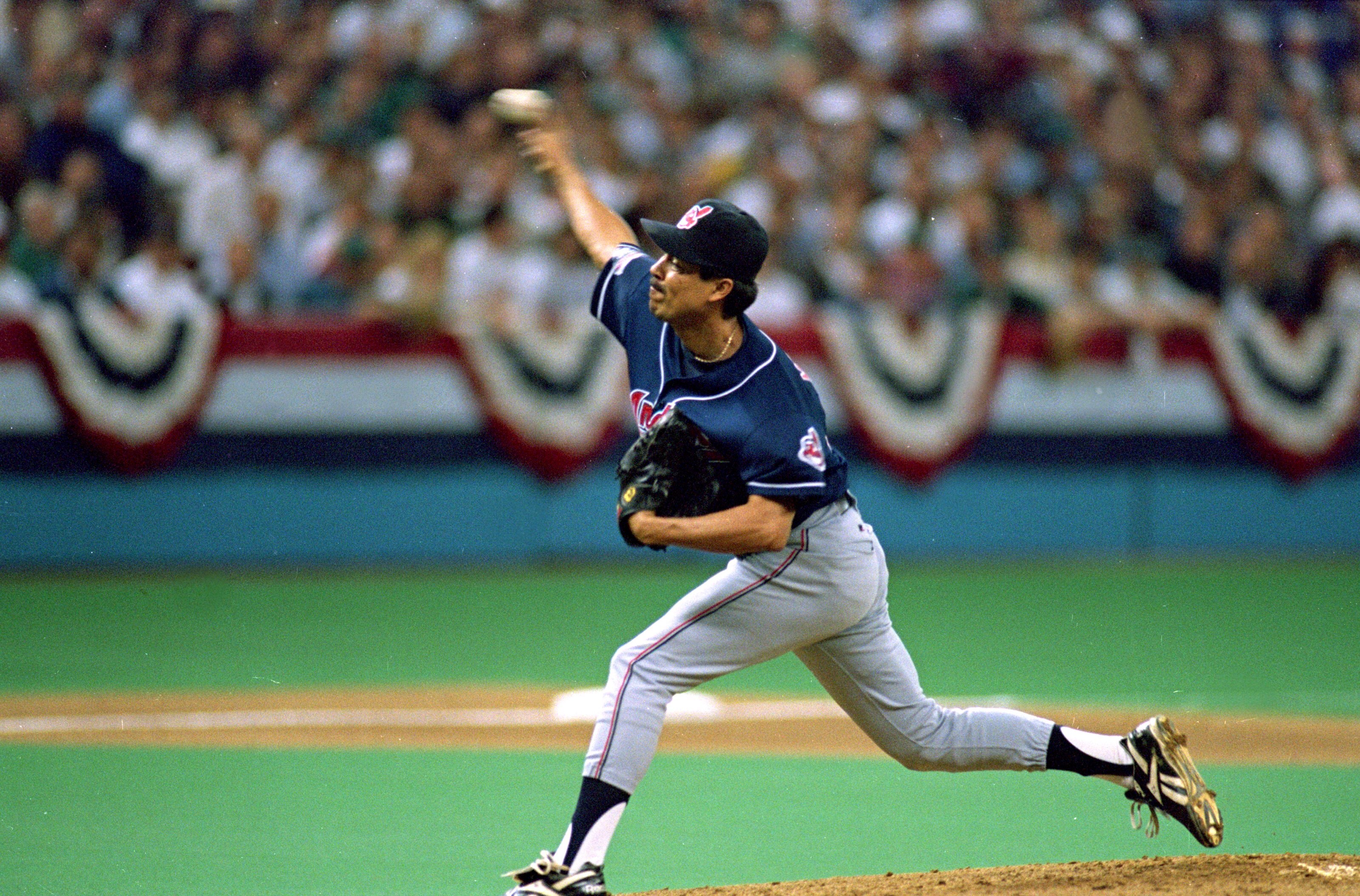 17 Oct 1995: Dennis Martinez of the Cleveland Indians pitches the ball during the American League Conference game against the Seattle Mariners at the Kingdome in Seattle, Washington. The Indians defeated the Mariners 4-0. Mandatory Credit: Stephen Dunn  /
