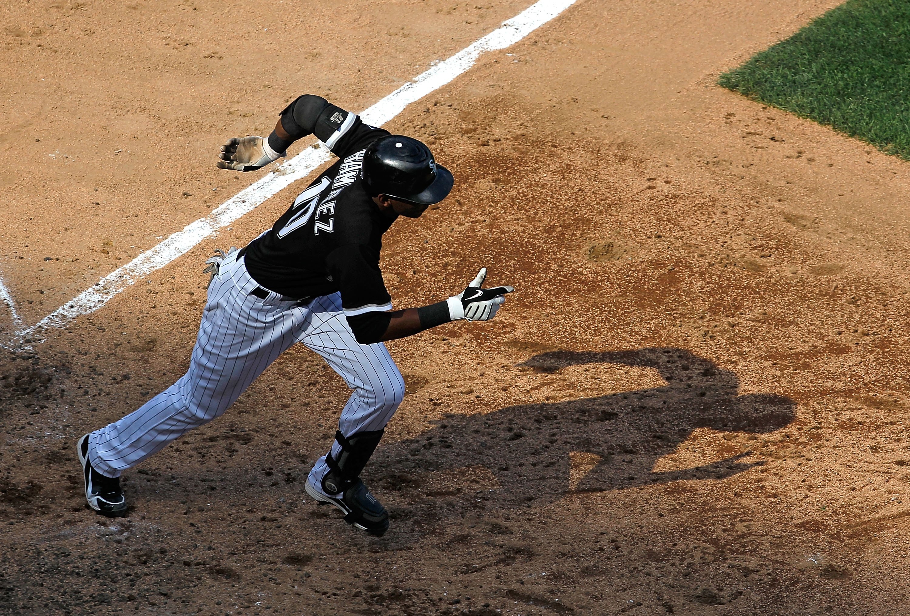 CHICAGO - JUNE 25: Alexei Ramirez #10 of the Chicago White Sox runs after hitting the ball against the Chicago Cubs at U.S. Cellular Field on June 25, 2010 in Chicago, Illinois. The White Sox defeated the Cubs 6-0. (Photo by Jonathan Daniel/Getty Images)