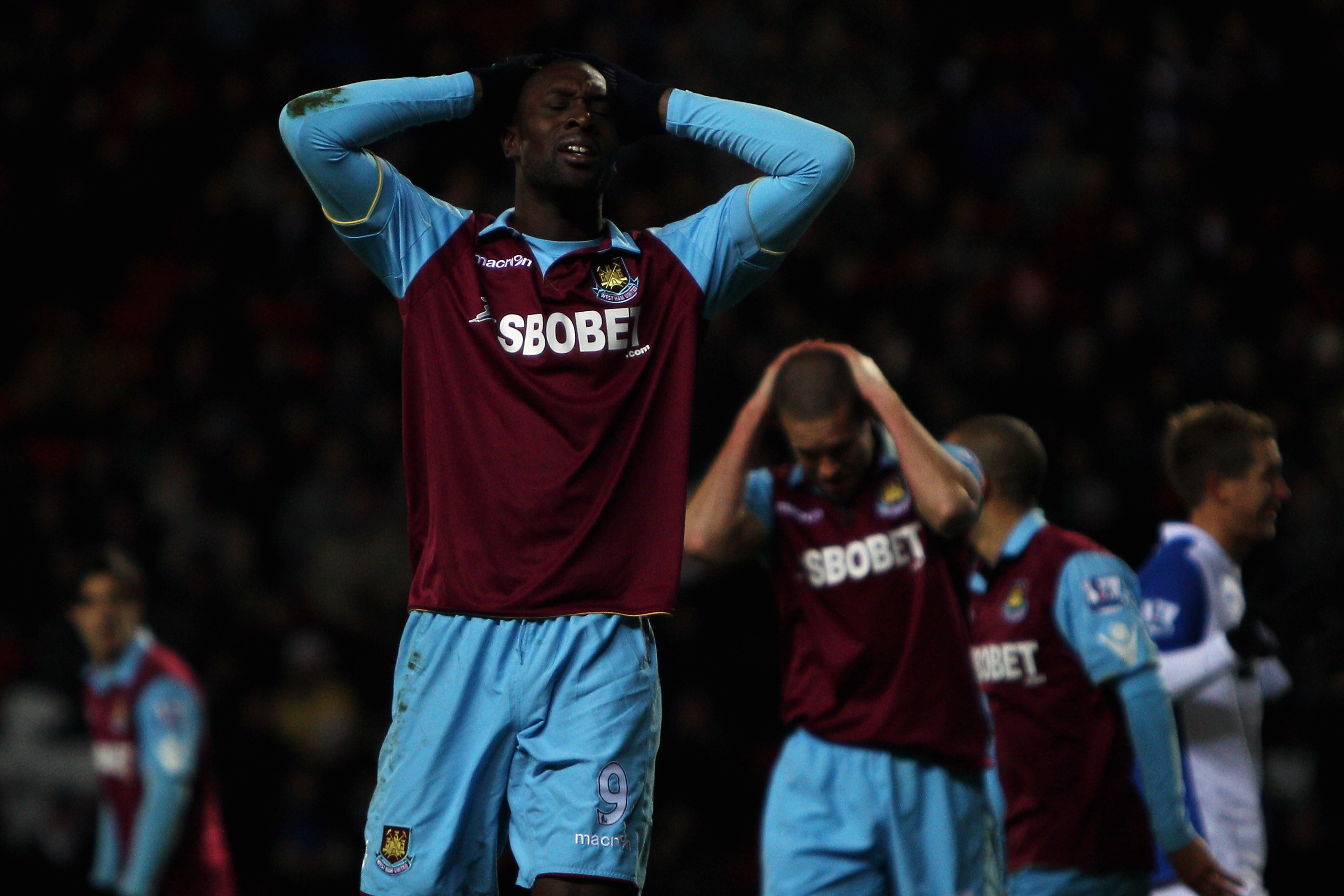 BLACKBURN, ENGLAND - DECEMBER 18:  Carlton Cole of West Ham holds his head after a missed chance during the Barclays Premier League match between Blackburn Rovers and West Ham United at Ewood park on December 18, 2010 in Blackburn, England.  (Photo by Dea