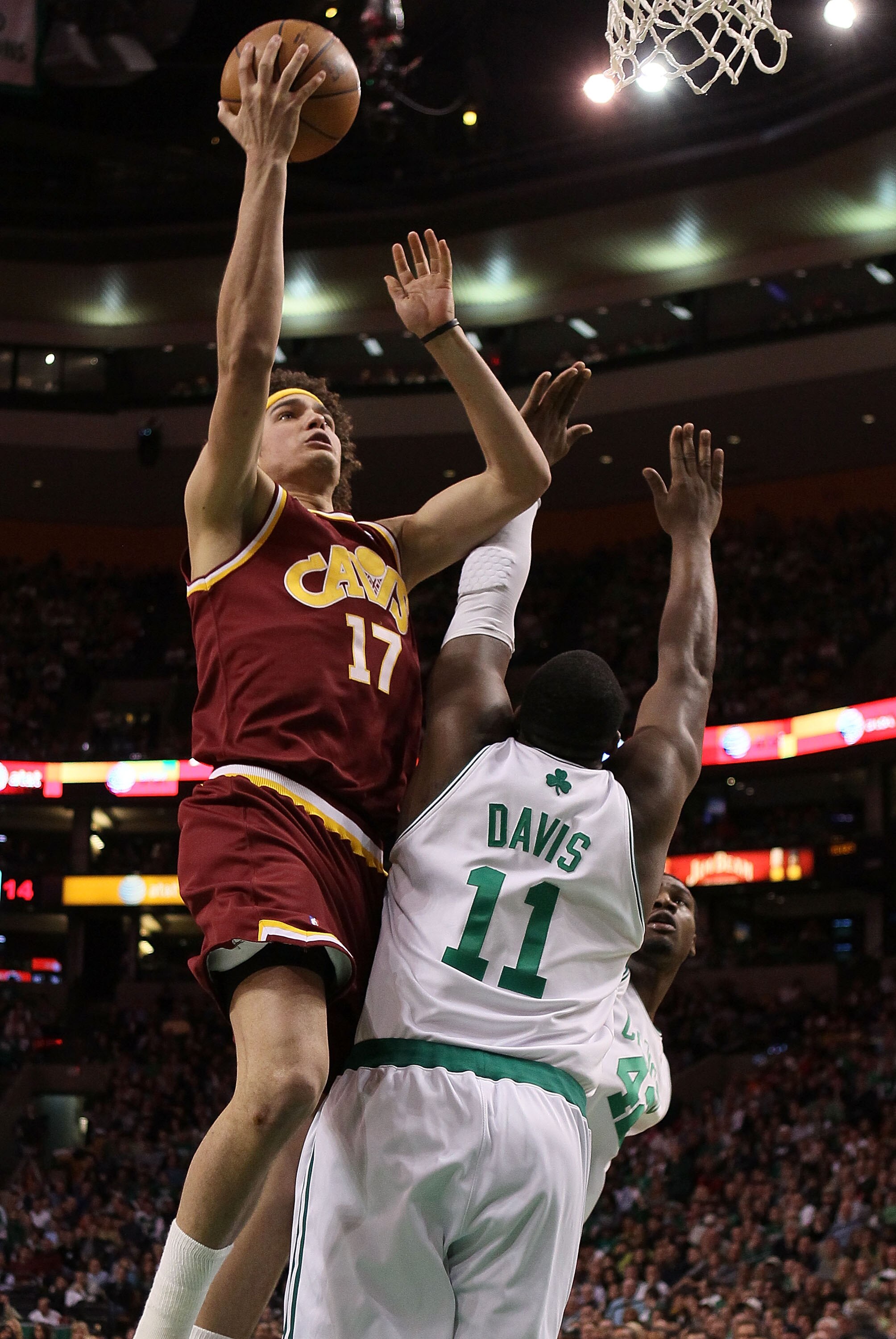 BOSTON - MAY 09:  Anderson Varejao #17 of the Cleveland Cavaliers heads for the basket as Glen Davis #11 of the Boston Celtics defends during Game Four of the Eastern Conference Semifinals of the 2010 NBA playoffs at TD Garden on May 9, 2010 in Boston, Ma