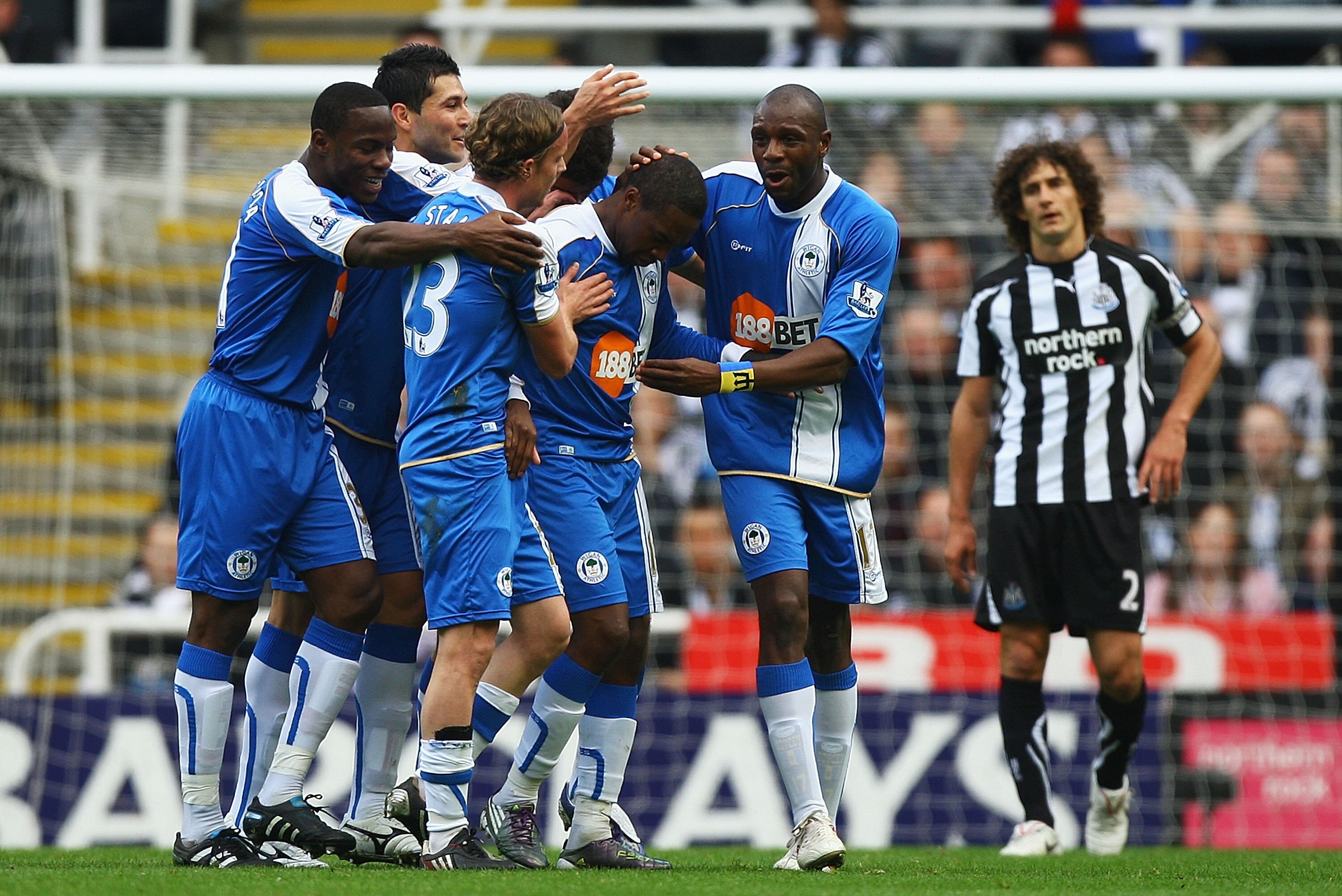 NEWCASTLE UPON TYNE, ENGLAND - OCTOBER 16:  Charles N'Zogbia of Wigan is congratulated on his second goal during the Barclays Premier League match between Newcastle United and Wigan Athletic at St James' Park on October 16, 2010 in Newcastle upon Tyne, En