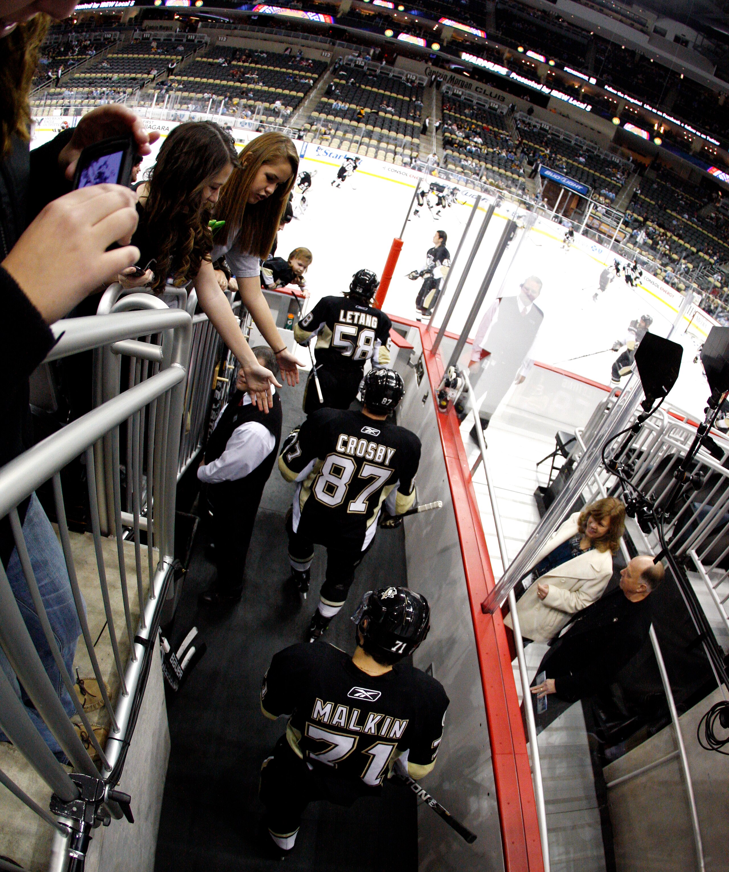 PITTSBURGH, PA - DECEMBER 22:  Evgeni Malkin #71, Sidney Crosby #87 and Kris Letang #58 of the Pittsburgh Penguins take the ice for warmups before play against the Florida Panthers at Consol Energy Center on December 22, 2010 in Pittsburgh, Pennsylvania.
