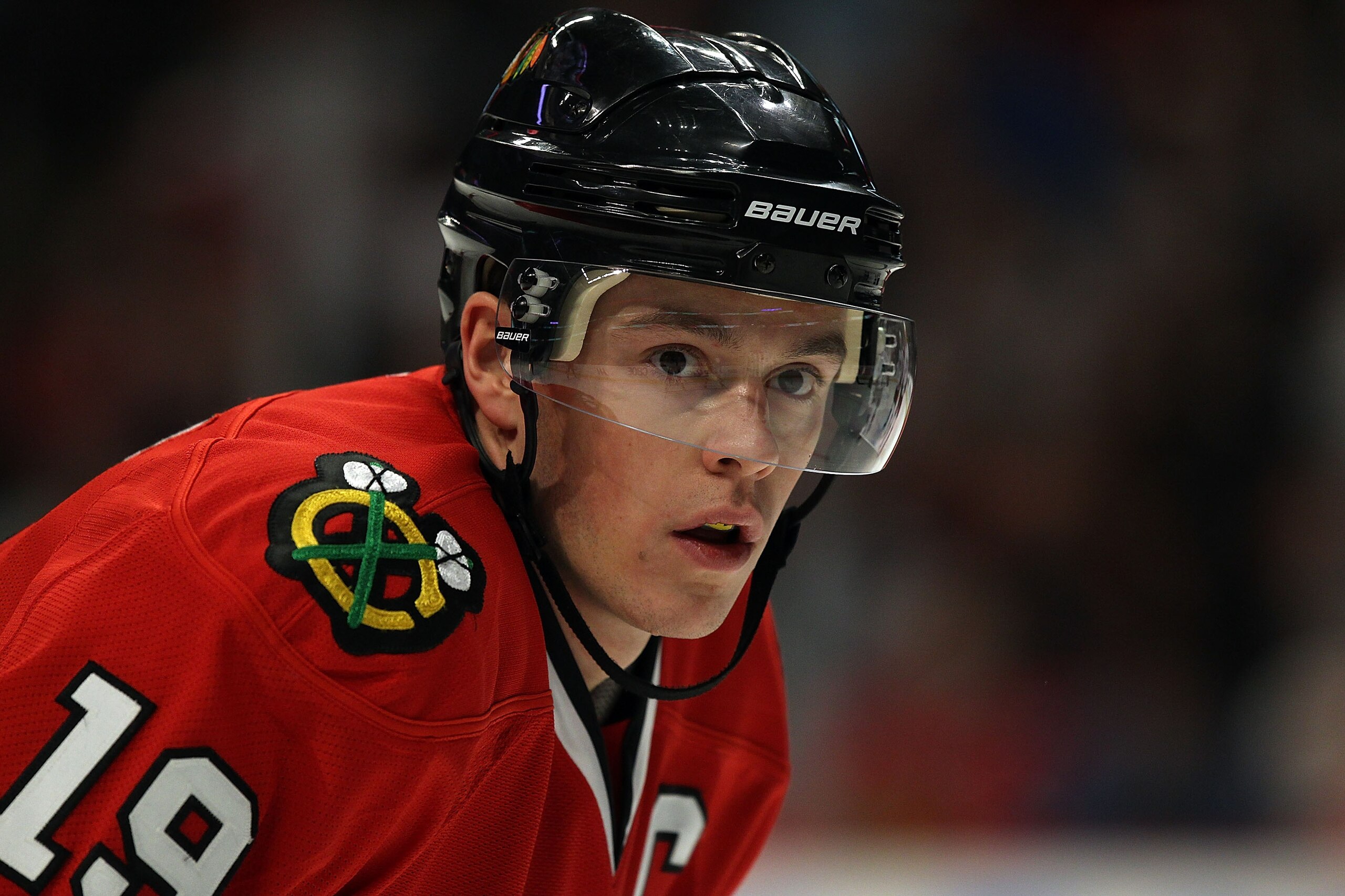 CHICAGO, IL - DECEMBER 15: Jonathan Toews #19 of the Chicago Blackhawks waits for a face-off against the Colorado Avalanche at the United Center on December 15, 2010 in Chicago, Illinois. The Avalanche defeated the Blackhawks 4-3. (Photo by Jonathan Danie