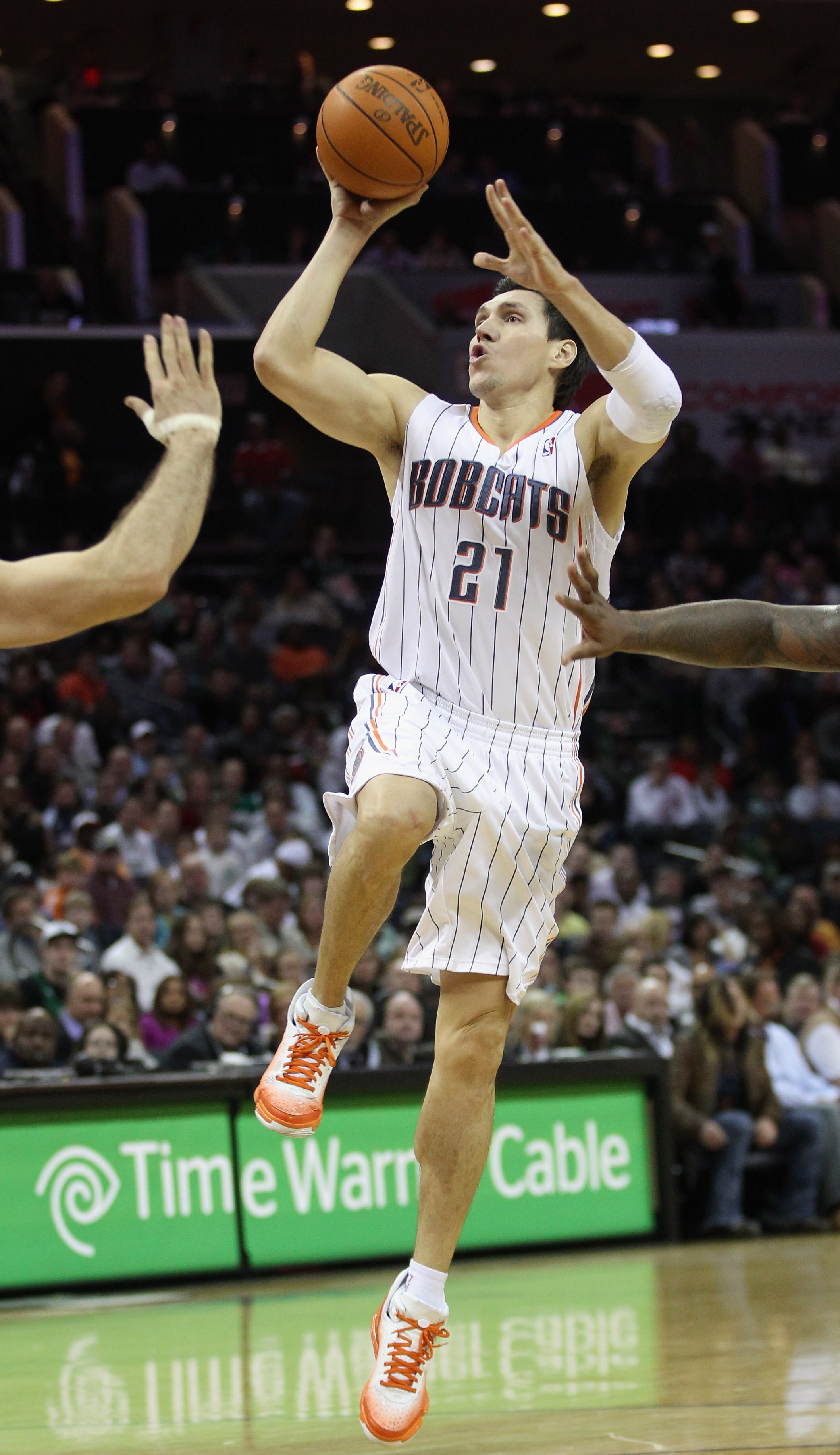 CHARLOTTE, NC - DECEMBER 11:  Eduardo Najera #21 of the Charlotte Bobcats against the Boston Celtics during their game at Time Warner Cable Arena on December 11, 2010 in Charlotte, North Carolina. NOTE TO USER: User expressly acknowledges and agrees that,