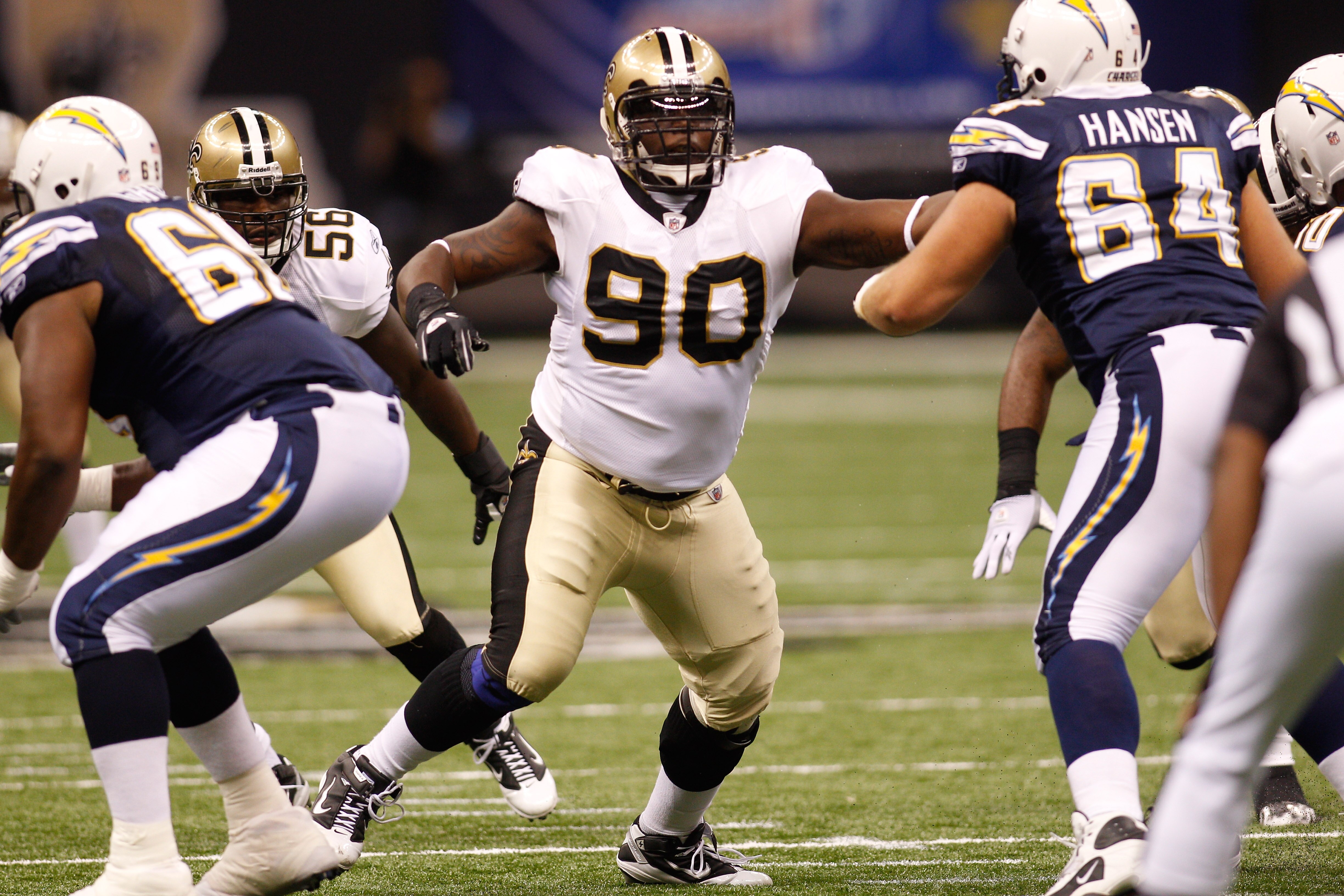 NEW ORLEANS - AUGUST 27:  DeMario Pressley #90 of the New Orleans Saints in action against the San Diego Chargers at the Louisiana Superdome on August 27, 2010 in New Orleans, Louisiana.  (Photo by Chris Graythen/Getty Images)