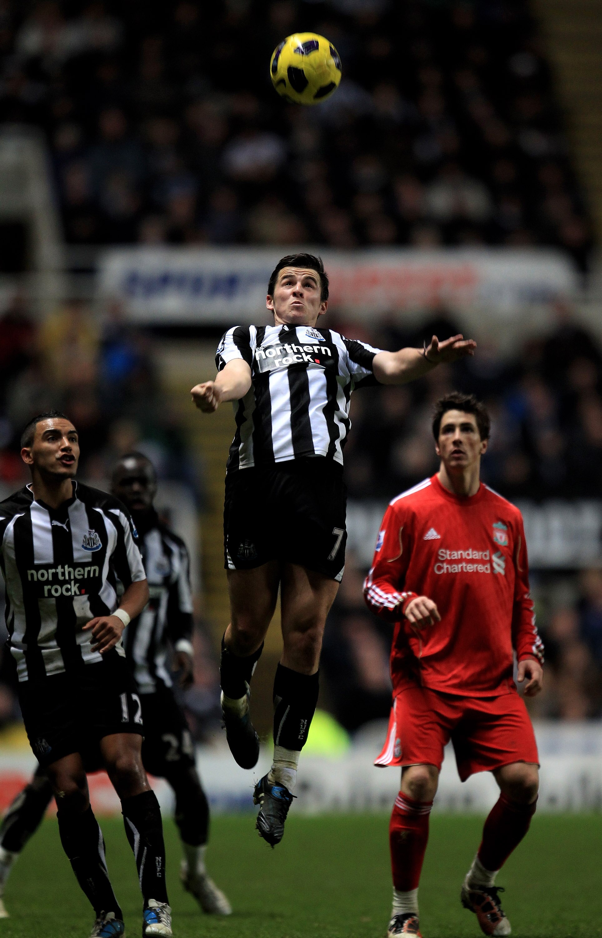 NEWCASTLE UPON TYNE, ENGLAND - DECEMBER 11:  Joey Barton of Newcastle United wins the ball during the Barclays Premier League match between Newcastle United and Liverpool at St James' Park on December 11, 2010 in Newcastle, England.  (Photo by Mark Thomps