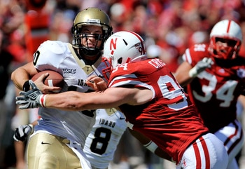 LINCOLN, NE - SEPTEMBER 11: Nebraska Cornhuskers defensive tackle Jared Crick #94 takes downIdaho Vandals quarterback Nathan Enderle #10 during second half action of their game at Memorial Stadium on September 4, 2010 in Lincoln, Nebraska. Nebraska Defeat
