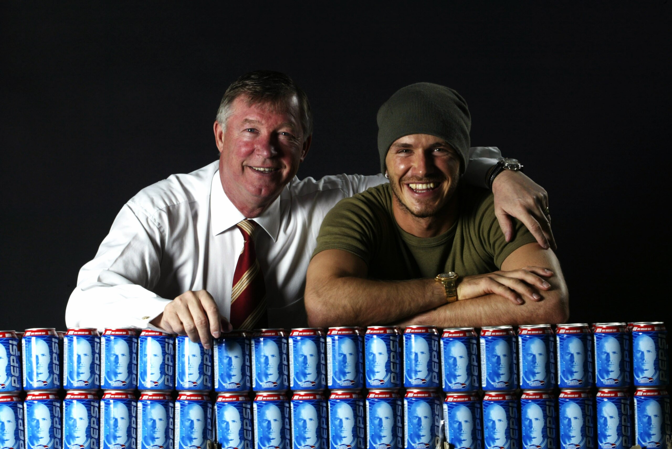 MANCHESTER - APRIL 26: Manchester United and England star David Beckham and Manchester United manager Sir Alex Ferguson help launch the One Dream Day and Pepsi Player Party Promotions held at Carrington, in Manchester, England on April 26, 2002. DIGITAL MANCHESTER - APRIL 26: Manchester United and England star David Beckham and Manchester United manager Sir Alex Ferguson help launch the One Dream Day and Pepsi Player Party Promotions held at Carrington, in Manchester, England on April 26, 2002. DIGITAL