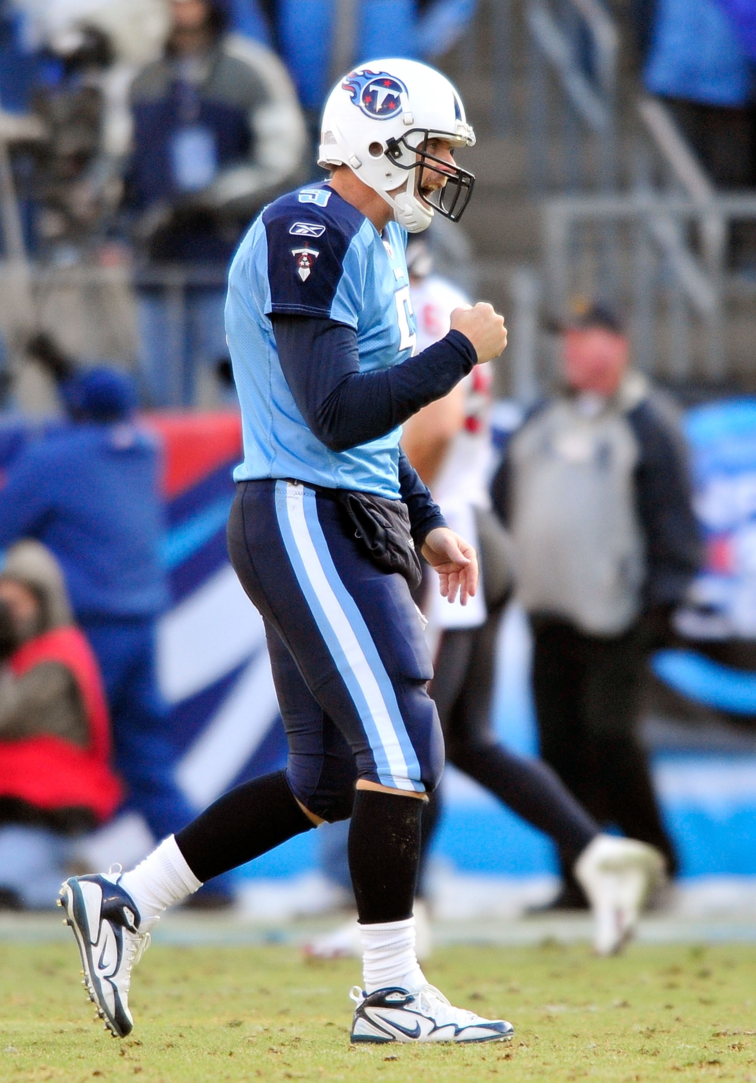 NASHVILLE, TN - DECEMBER 19:  Kerry Collins #5 of the Tennessee Titans celebrates after a touchdown by teammate Chris Johnson against the Houston Texans at LP Field on December 19, 2010 in Nashville, Tennessee. The Titans defeated the Texans, 31-17.  (Pho