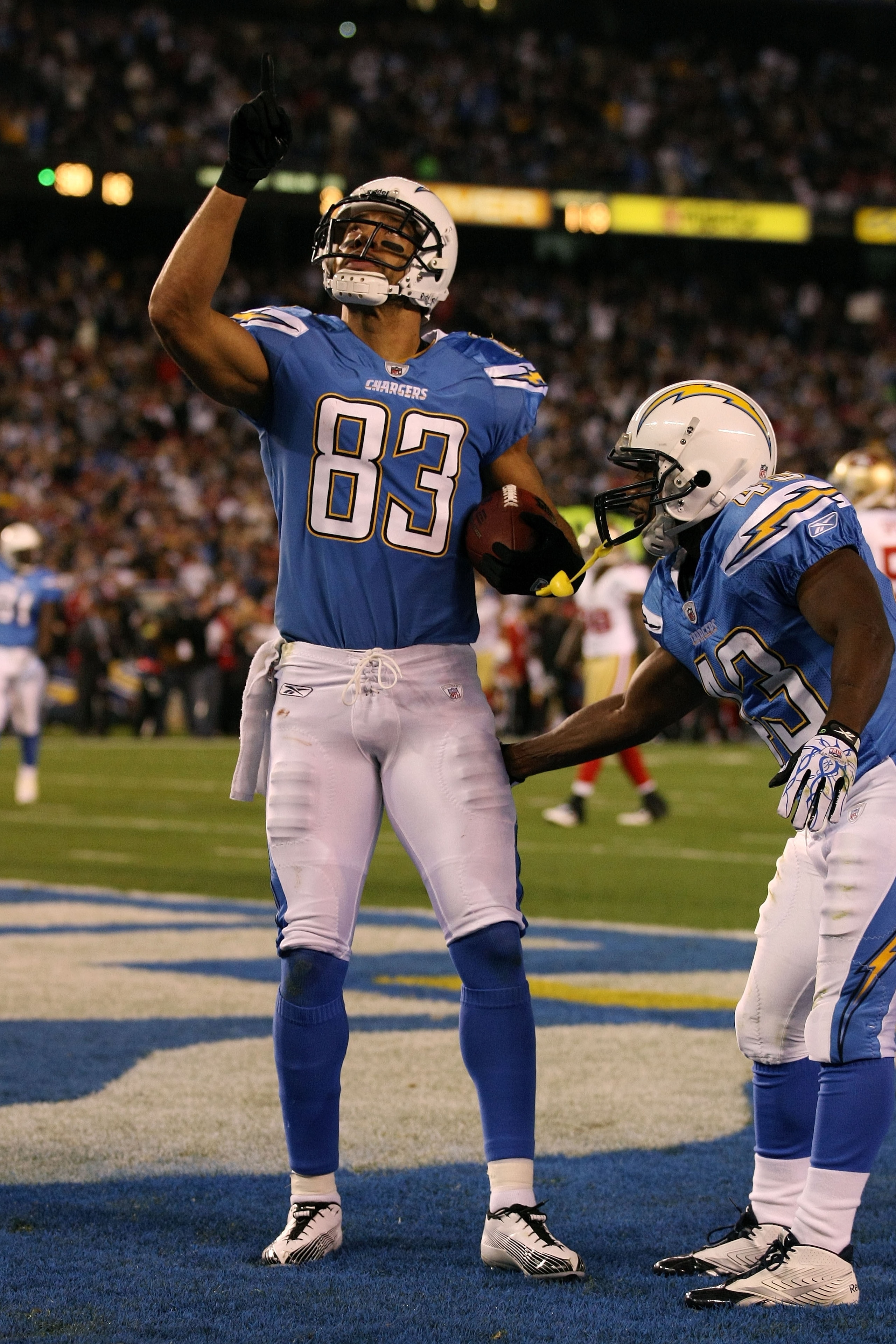SAN DIEGO, CA - DECEMBER 16:  Wide receiver Vincent Jackson #83 of the San Diego Chargers celebrates scoring a touchdown in the second quarter against the San Francisco 49ers at Qualcomm Stadium on December 16, 2010 in San Diego, California.  (Photo by Do