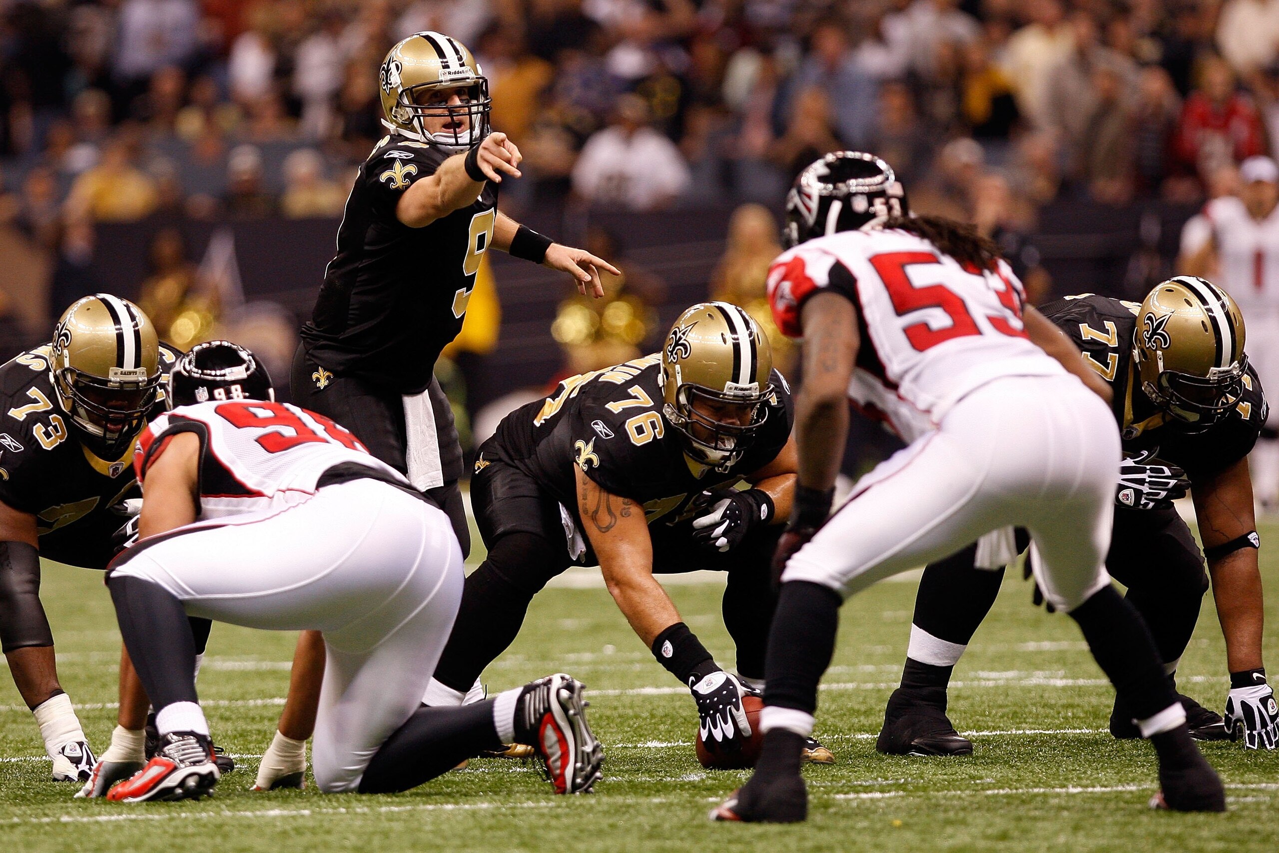 NEW ORLEANS - NOVEMBER 02:  Quarterback Drew Brees #9 of the New Orleans Saints calls a play against the Atlanta Falcons at Louisana Superdome on November 2, 2009 in New Orleans, Louisiana.  (Photo by Chris Graythen/Getty Images)