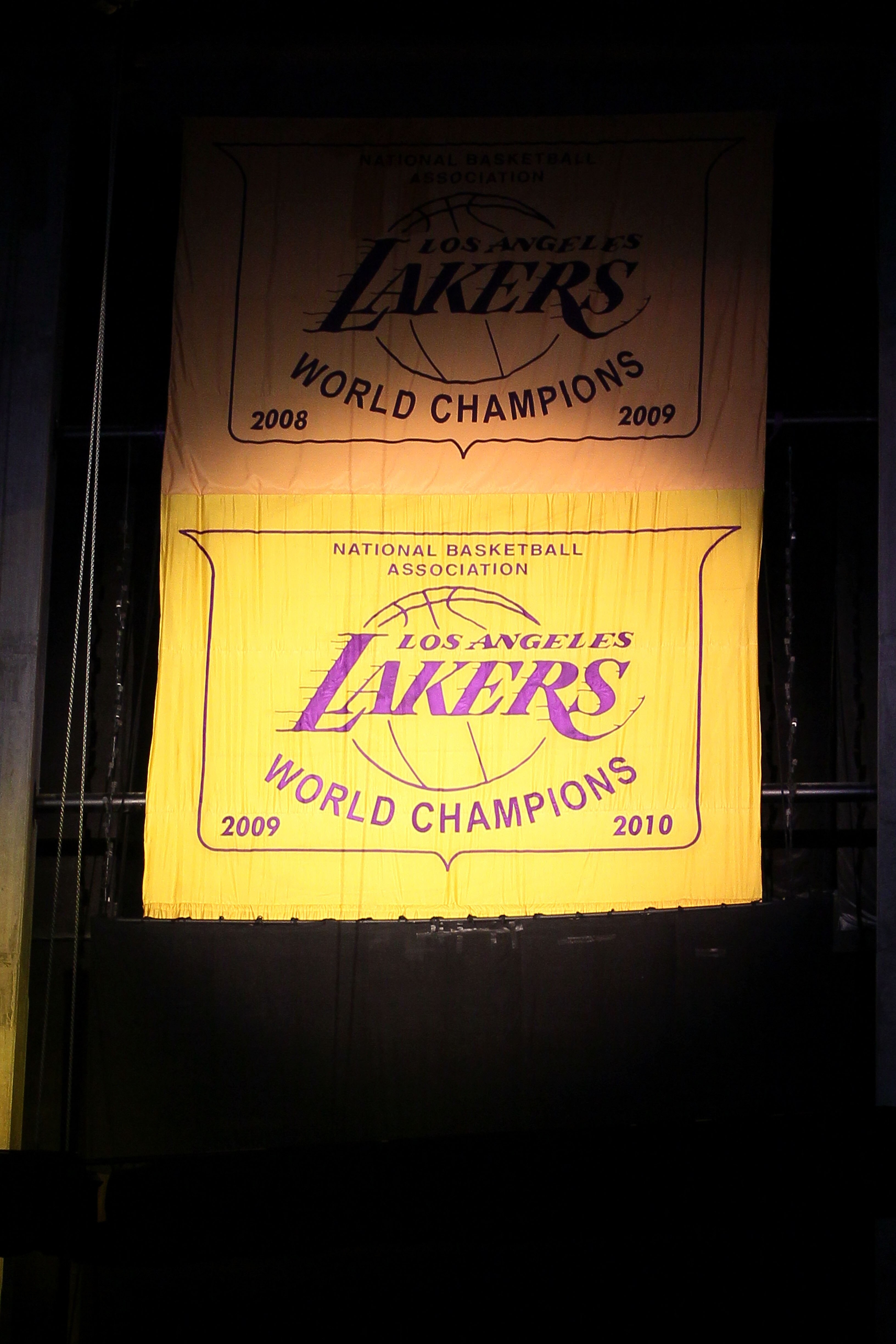 LOS ANGELES, CA - OCTOBER 26:  The 2009-2010 Los Angeles Lakers Championship Banner is unveiled during a ceremony prior to their opening night game against the Houston Rockets at Staples Center on October 26, 2010 in Los Angeles, California. NOTE TO USER: