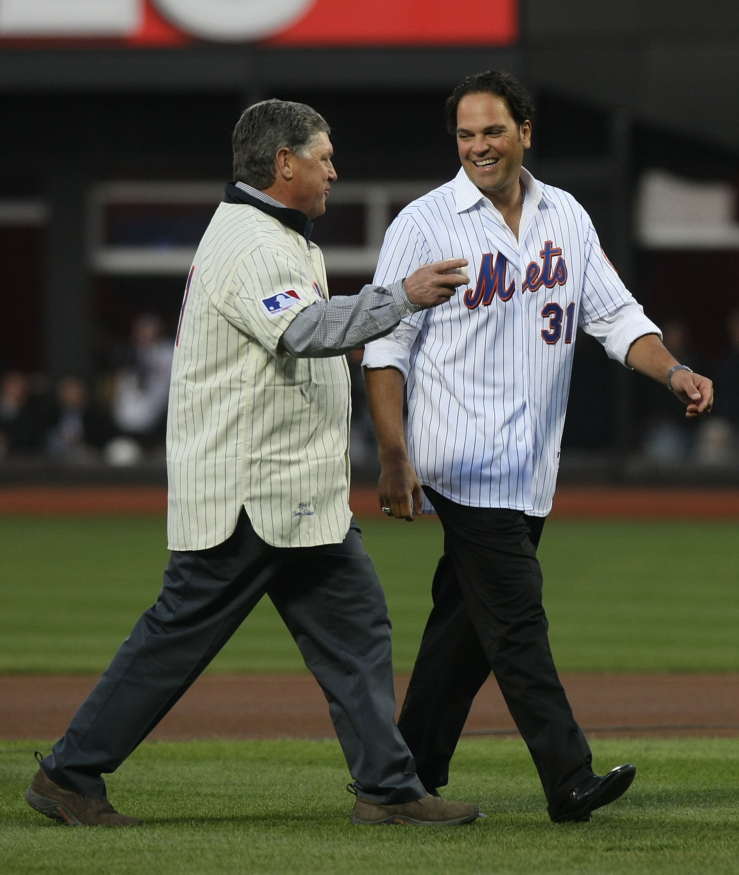 FLUSHING, NY - APRIL 13:  Former Mets players Tom Seaver and Mike Piazza take the field prior to the game between the New York Mets and the San Diego Padres during opening day at Citi Field on April 13, 2009 in the Flushing neighborhood of the Queens boro