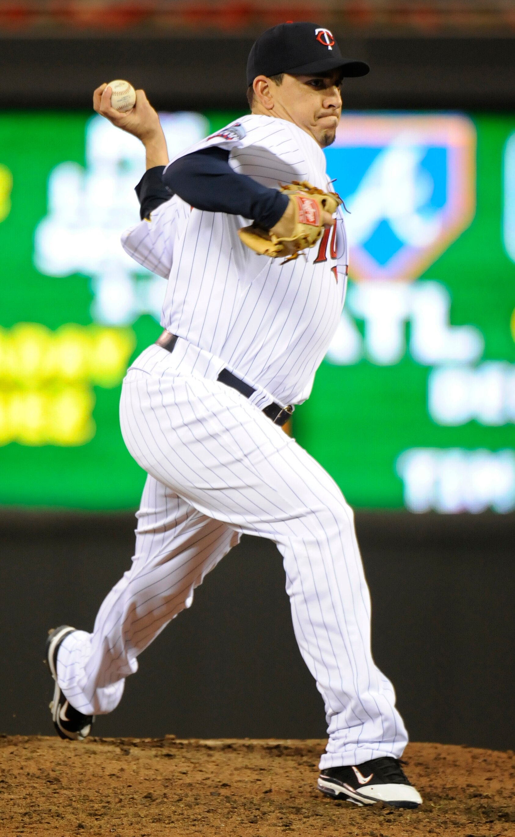 MINNEAPOLIS, MN - OCTOBER 6: Brian Fuentes #51 of the Minnesota Twins pitches during game one of the ALDS agaisnt the New York Yankees on October 6, 2010 at Target Field in Minneapolis, Minnesota. (Photo by Hannah Foslien/Getty Images)
