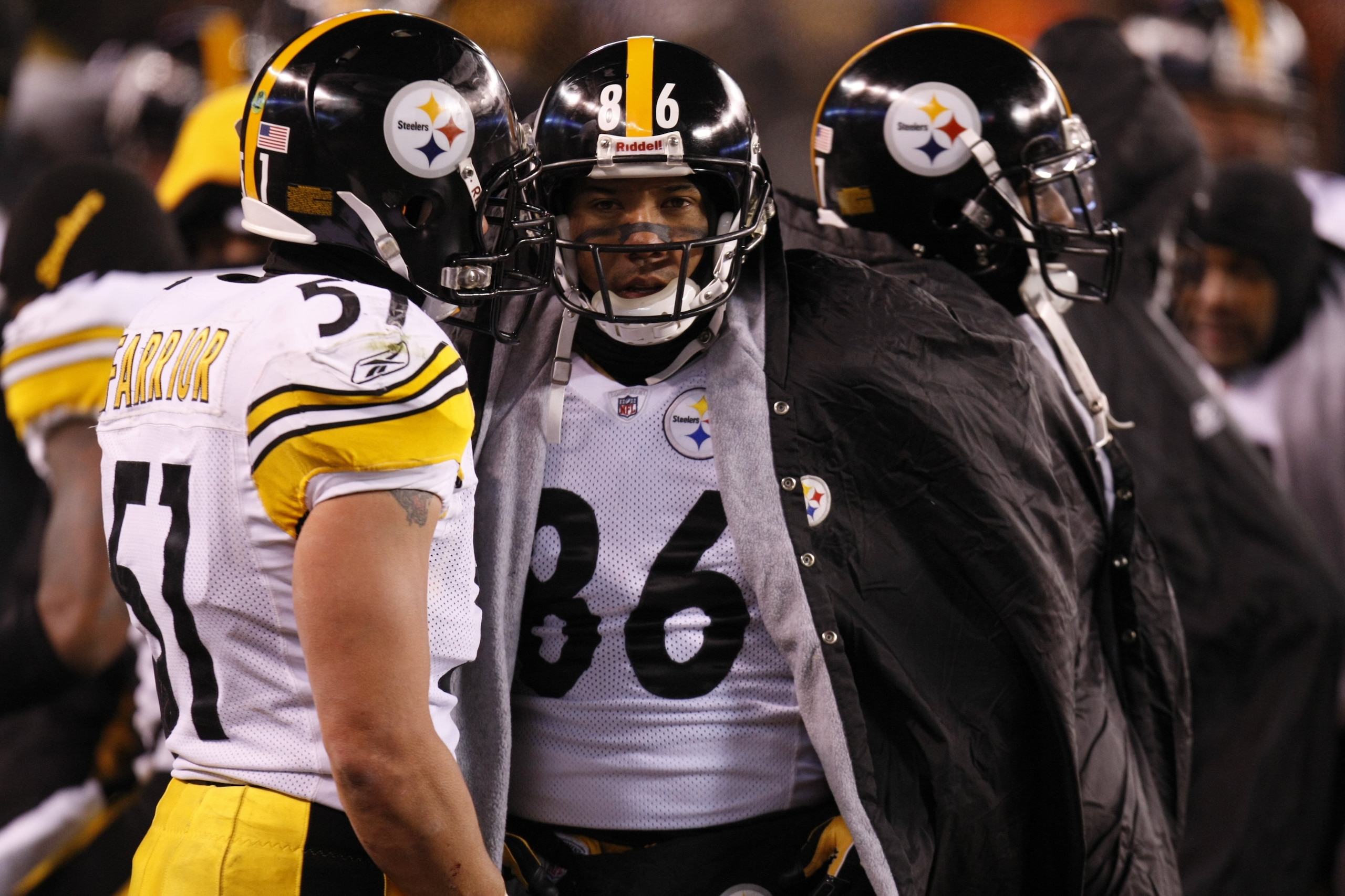 CLEVELAND - DECEMBER 10:  Hines Ward #86 and James Farrior #51 of the Pittsburgh Steelers stand on the sideline during the game against the Cleveland Browns on December 10, 2009 at Cleveland Browns Stadium in Cleveland, Ohio. Cleveland won the game 13-6.