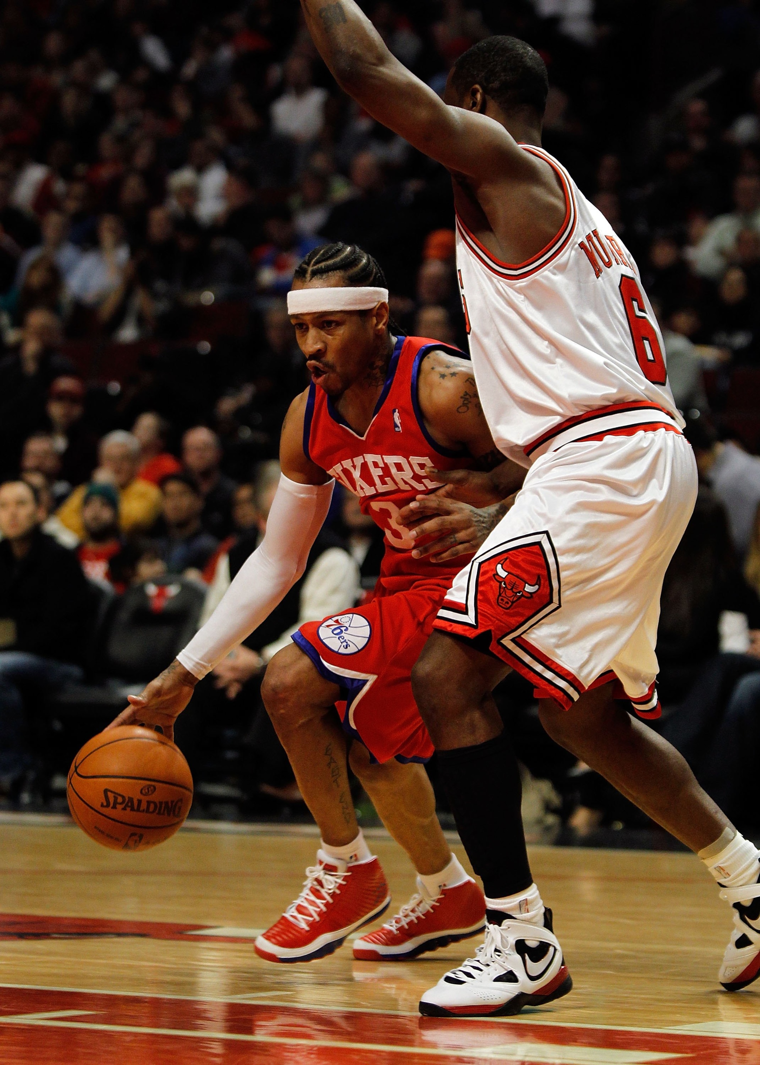CHICAGO - FEBRUARY 20: Allen Iverson #3 of the Philadelphia 76ers moves against Ronald Murray #6 of the Chicago Bulls at the United Center on February 20, 2010 in Chicago, Illinois. The Bulls defeated the 76ers 122-90. NOTE TO USER: User expressly acknowl