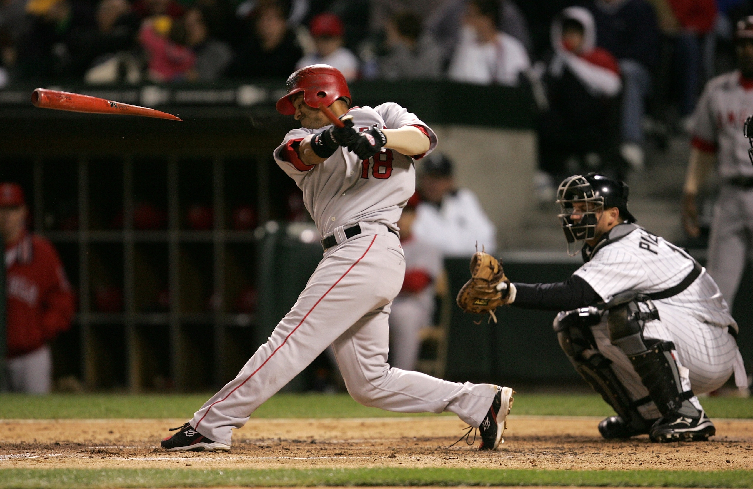 CHICAGO - SEPTEMBER 15:  Orlando Cabera #18 of the Los Angeles Angels of Anaheim breaks his bat while batting in the top of the fourth inning against Jon Garland #20 of the Chicago White Sox at U.S. Cellular Field on September 15, 2007 in Chicago, Illinoi