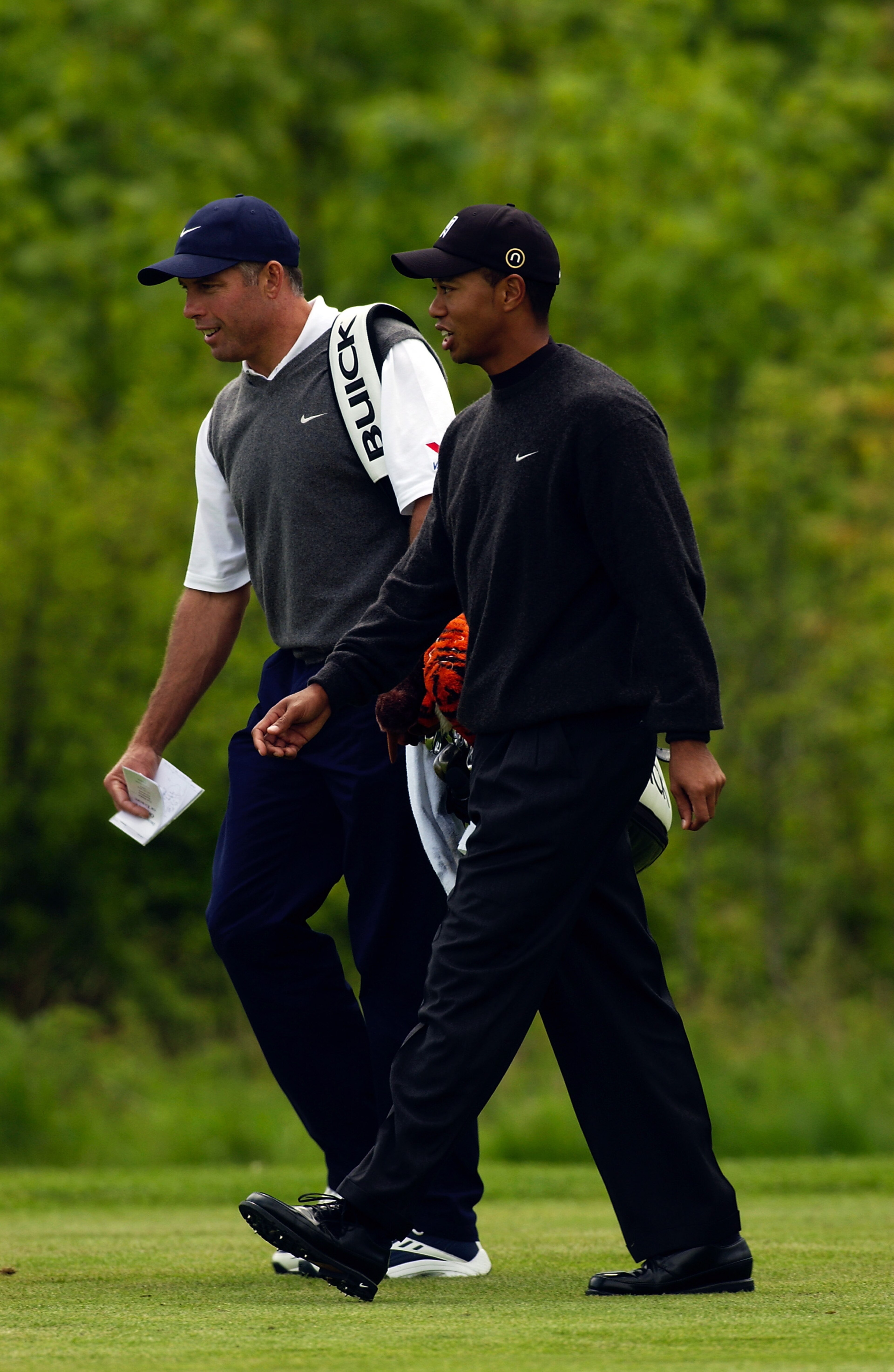 HAMBURG - MAY 14:  Tiger Woods of the USA and caddie Stevie Williams during the Pro-Am held prior to The SAP Deutsche Bank Open held on May 14, 2003 at The Gut Kaden Golf Club, in Hamburg, Germany. (Photo by Stuart Franklin/Getty Images)