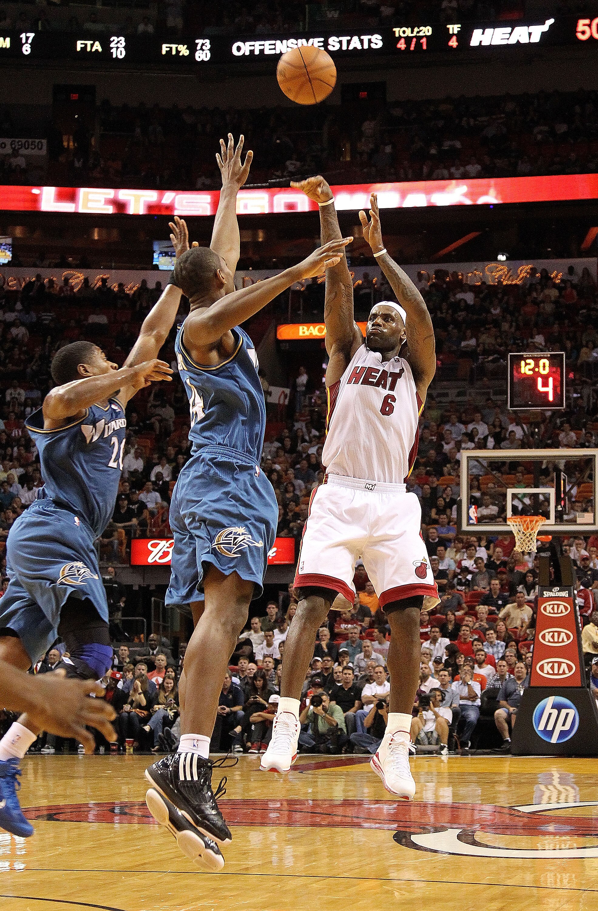 MIAMI, FL - NOVEMBER 29: LeBron James #6 of the Miami Heat shoots during a game against the Washington Wizards at American Airlines Arena on November 29, 2010 in Miami, Florida. NOTE TO USER: User expressly acknowledges and agrees that, by downloading and