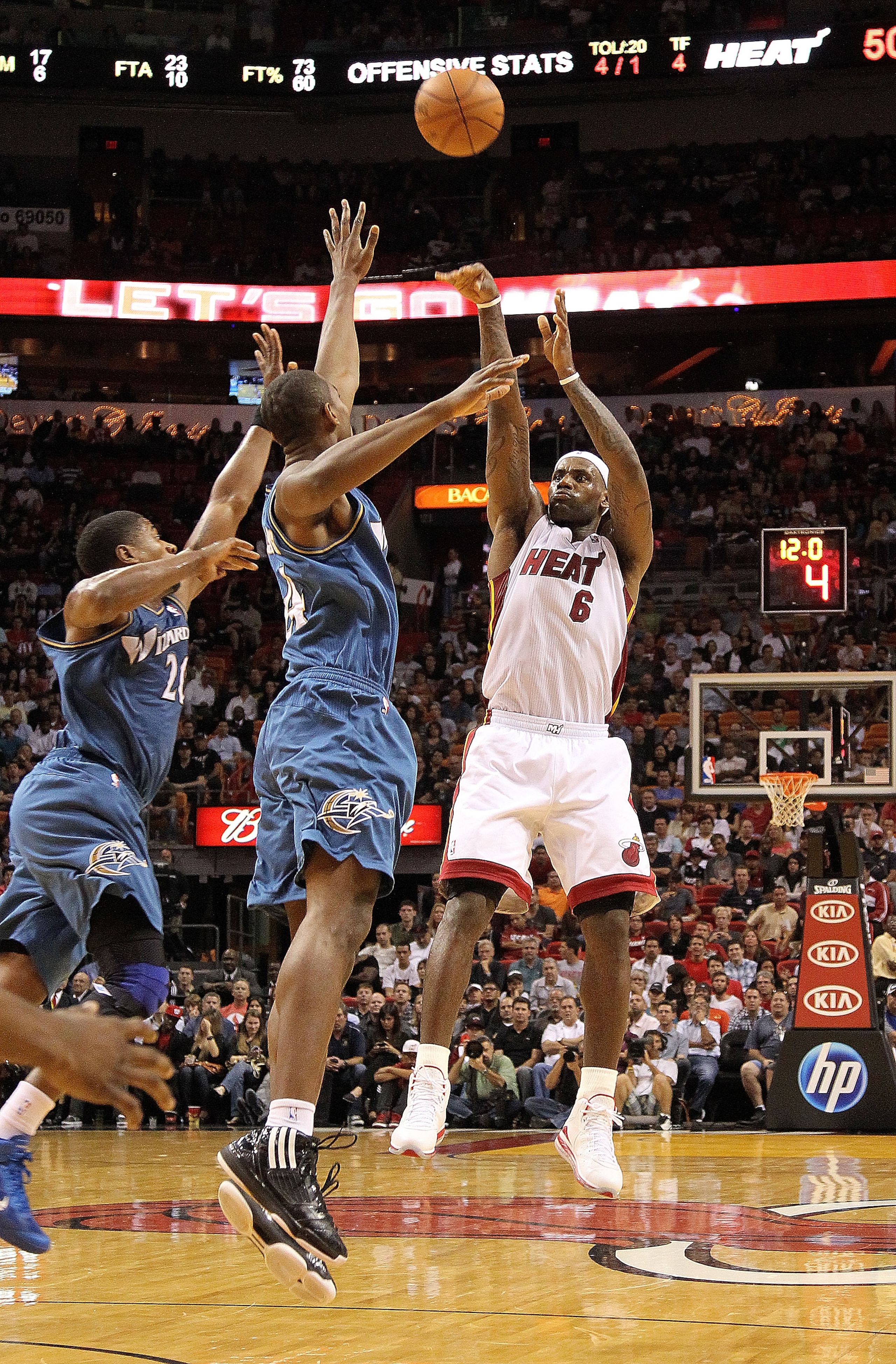 MIAMI, FL - NOVEMBER 29: LeBron James #6 of the Miami Heat shoots during a game against the Washington Wizards at American Airlines Arena on November 29, 2010 in Miami, Florida. NOTE TO USER: User expressly acknowledges and agrees that, by downloading and MIAMI, FL - NOVEMBER 29: LeBron James #6 of the Miami Heat shoots during a game against the Washington Wizards at American Airlines Arena on November 29, 2010 in Miami, Florida. NOTE TO USER: User expressly acknowledges and agrees that, by downloading and