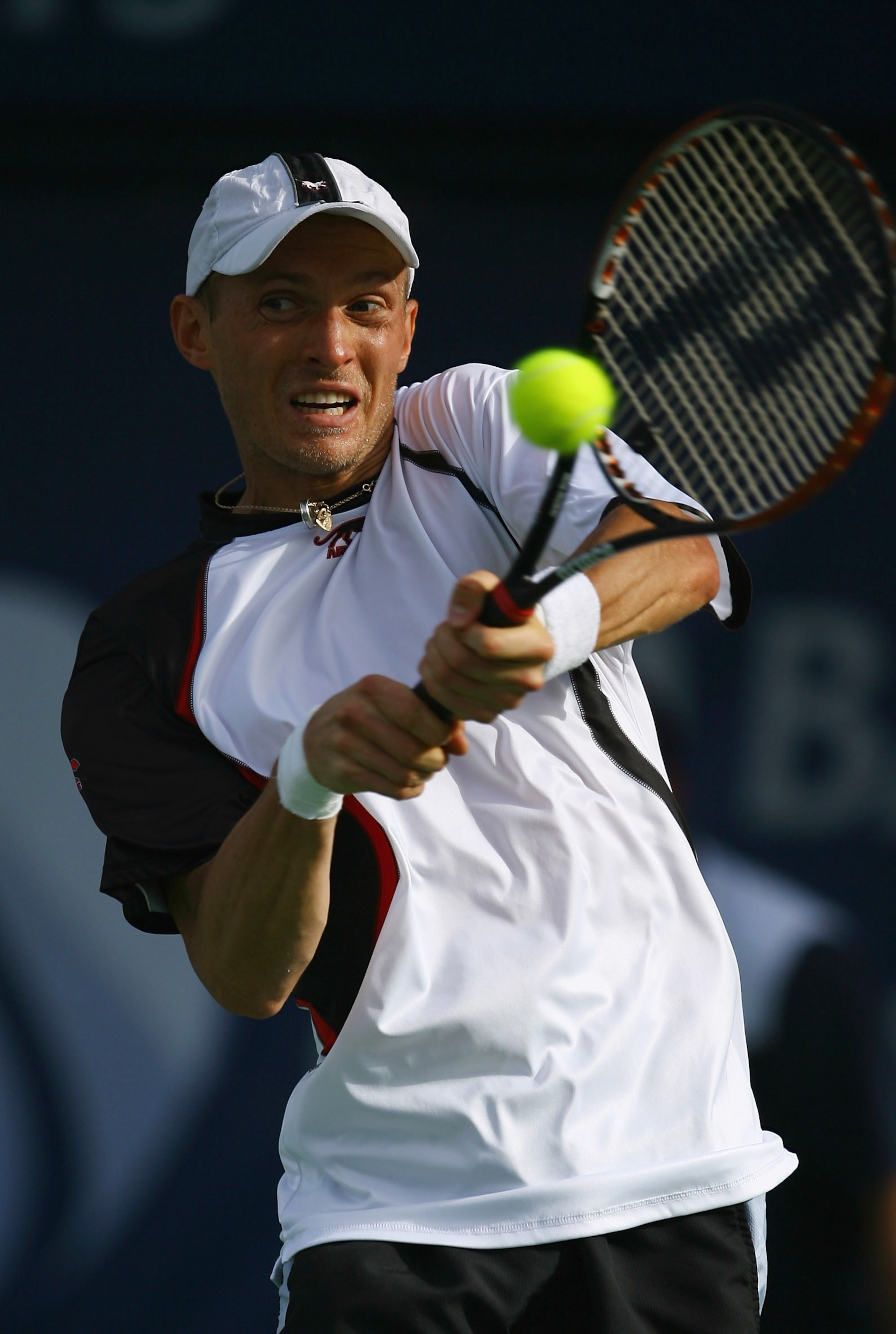 DUBAI, UNITED ARAB EMIRATES - MARCH 07:  Nikolay Davydenko of Russia in action against Feliciano Lopez of Spain during the ATP Barclays Dubai Tennis Championships at the Dubai Tennis Stadium on March 7, 2008 in Dubai, United Arab Emirates.  (Photo by Juli