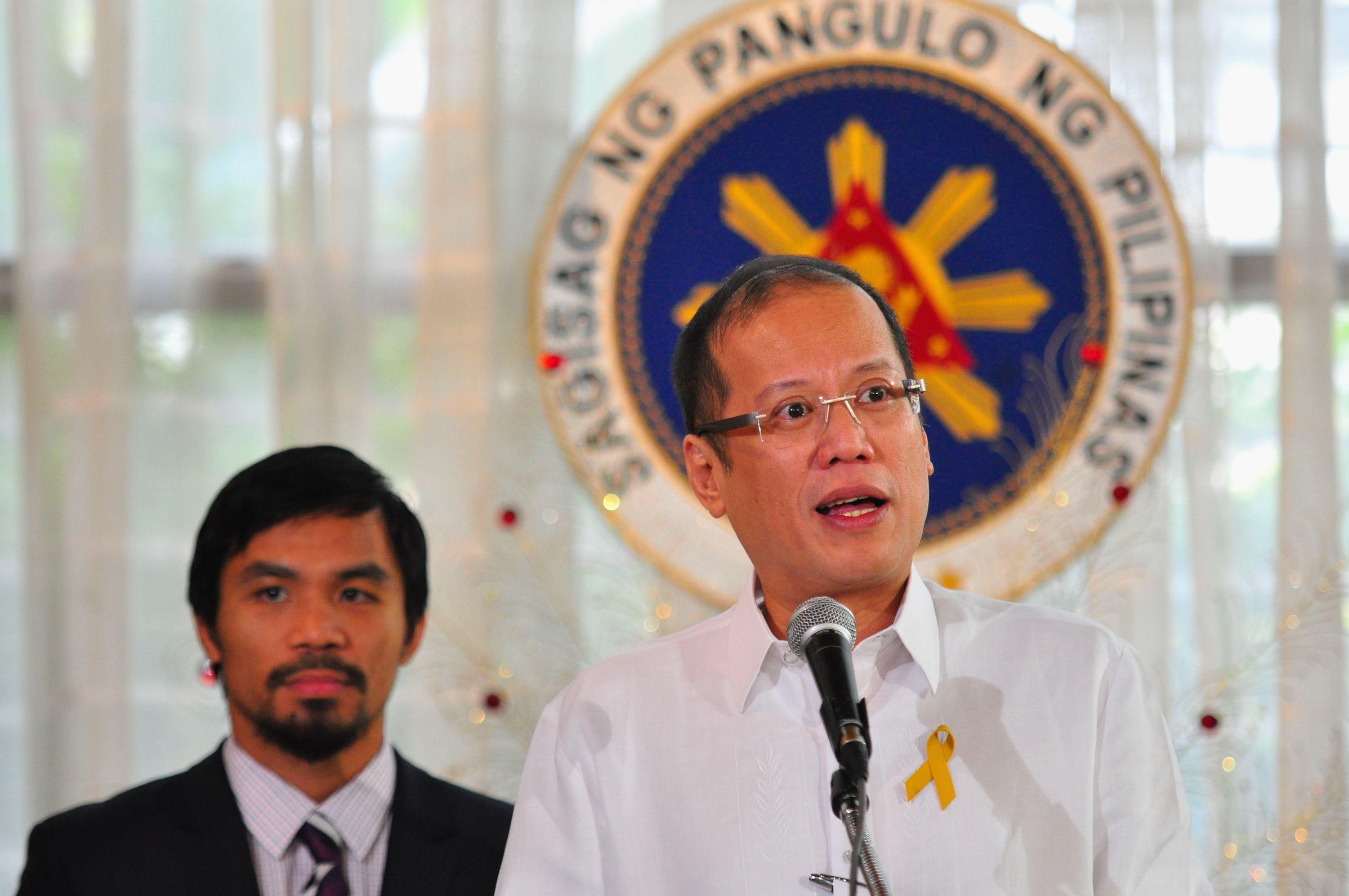 MANILA, PHILIPPINES - NOVEMBER 20:  Philippine President Benigno Aquinoo III addresses the audience at Malacanang Palace in Manila following Manny Pacquiao's win in the WBC super welterweight crown against Mexican Antonio Margarito on November 20, 2010 in