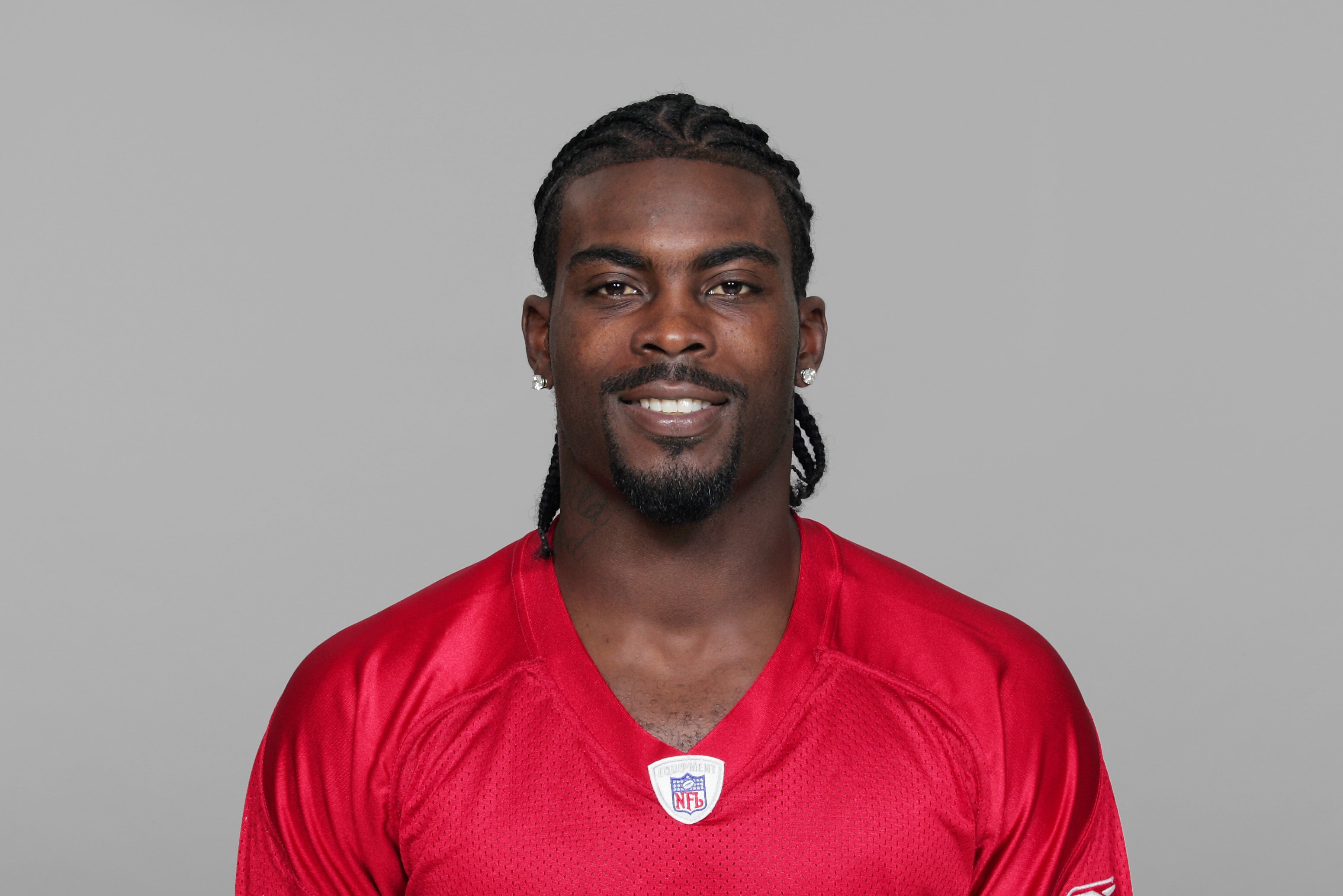 ATLANTA - 2007:  Michael Vick of the Atlanta Falcons poses for his 2007 NFL headshot at photo day in Atlanta, Georgia.  (Photo by Getty Images)