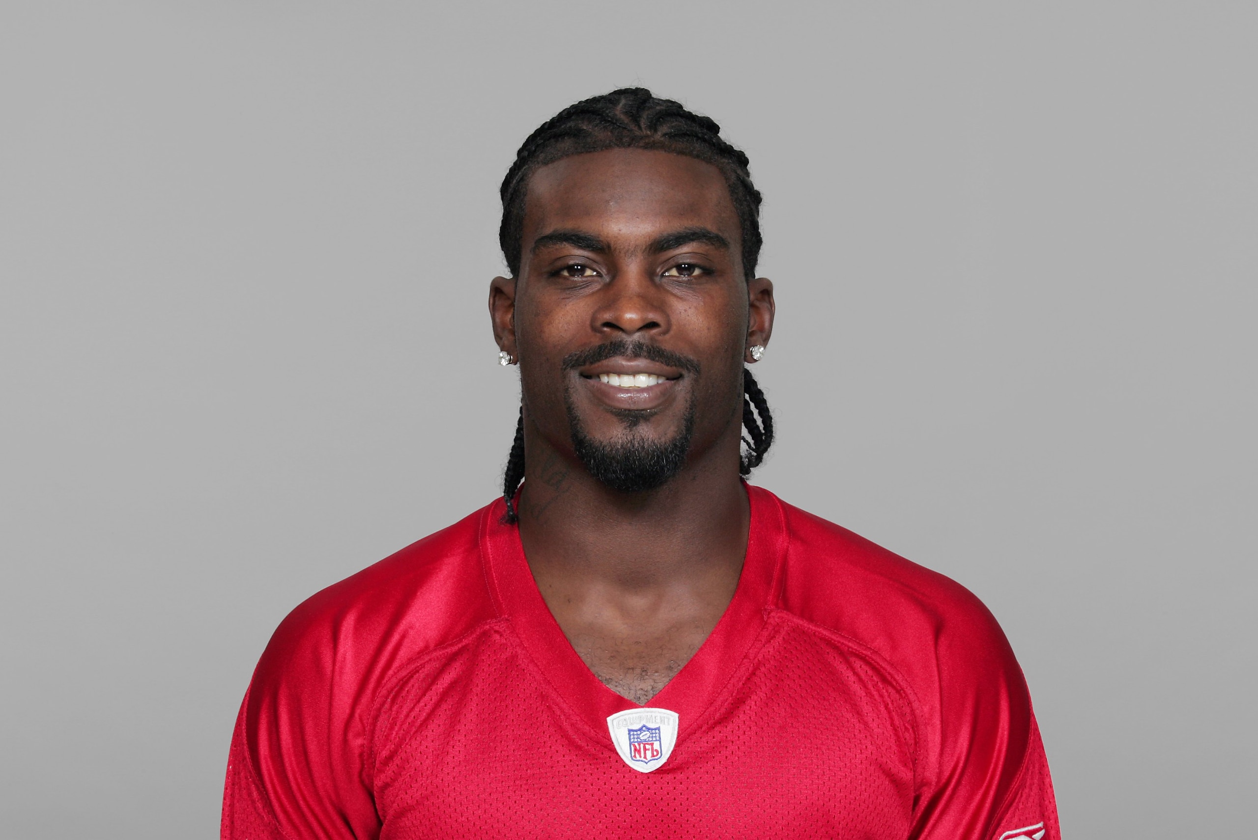 ATLANTA - 2007:  Michael Vick of the Atlanta Falcons poses for his 2007 NFL headshot at photo day in Atlanta, Georgia.  (Photo by Getty Images)