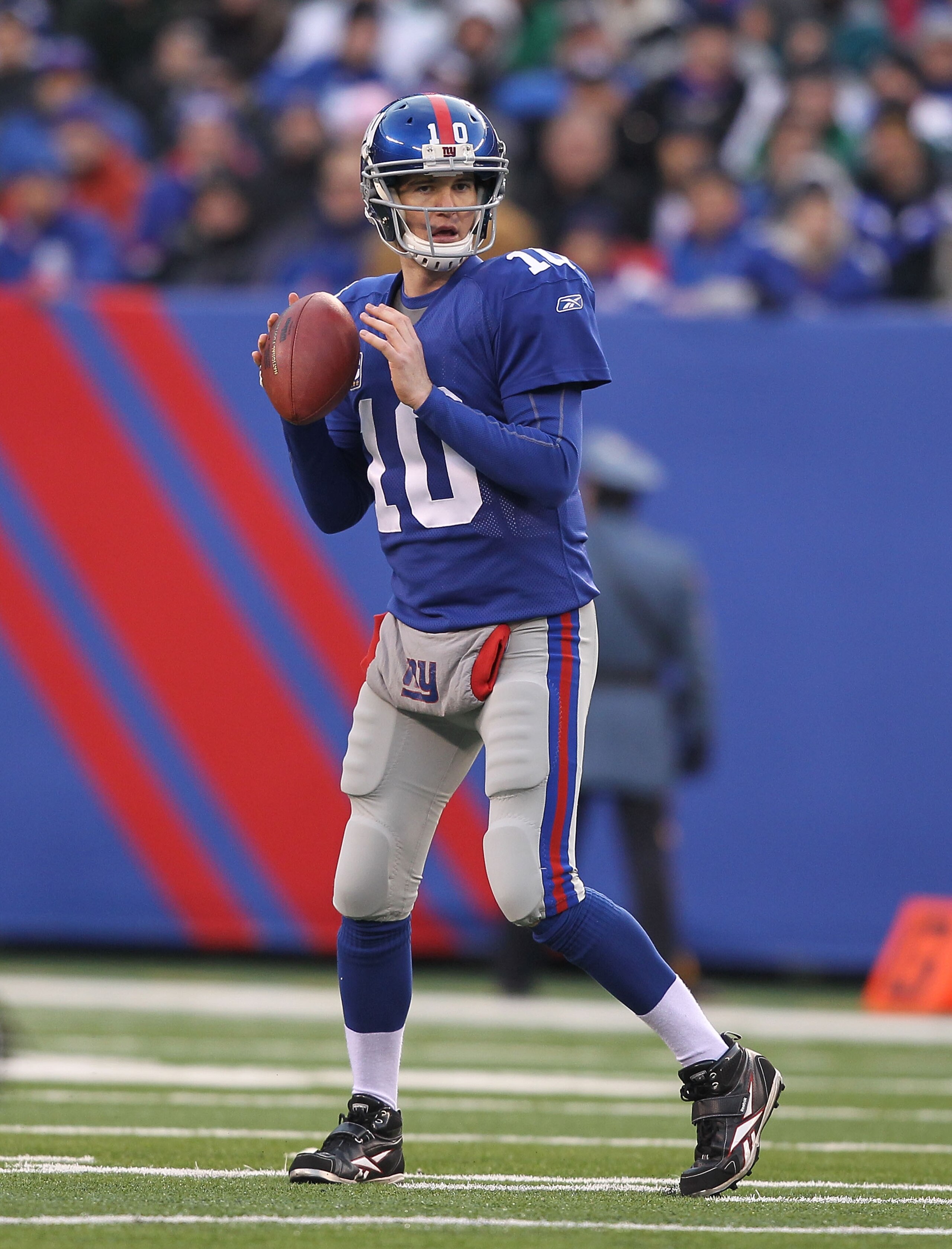 EAST RUTHERFORD, NJ - DECEMBER 19:  Eli Manning #10 of the New York Giants in action against the Philadelphia Eagles 38-31  on December 19, 2010 at The New Meadowlands Stadium in East Rutherford, New Jersey.  (Photo by Al Bello/Getty Images)