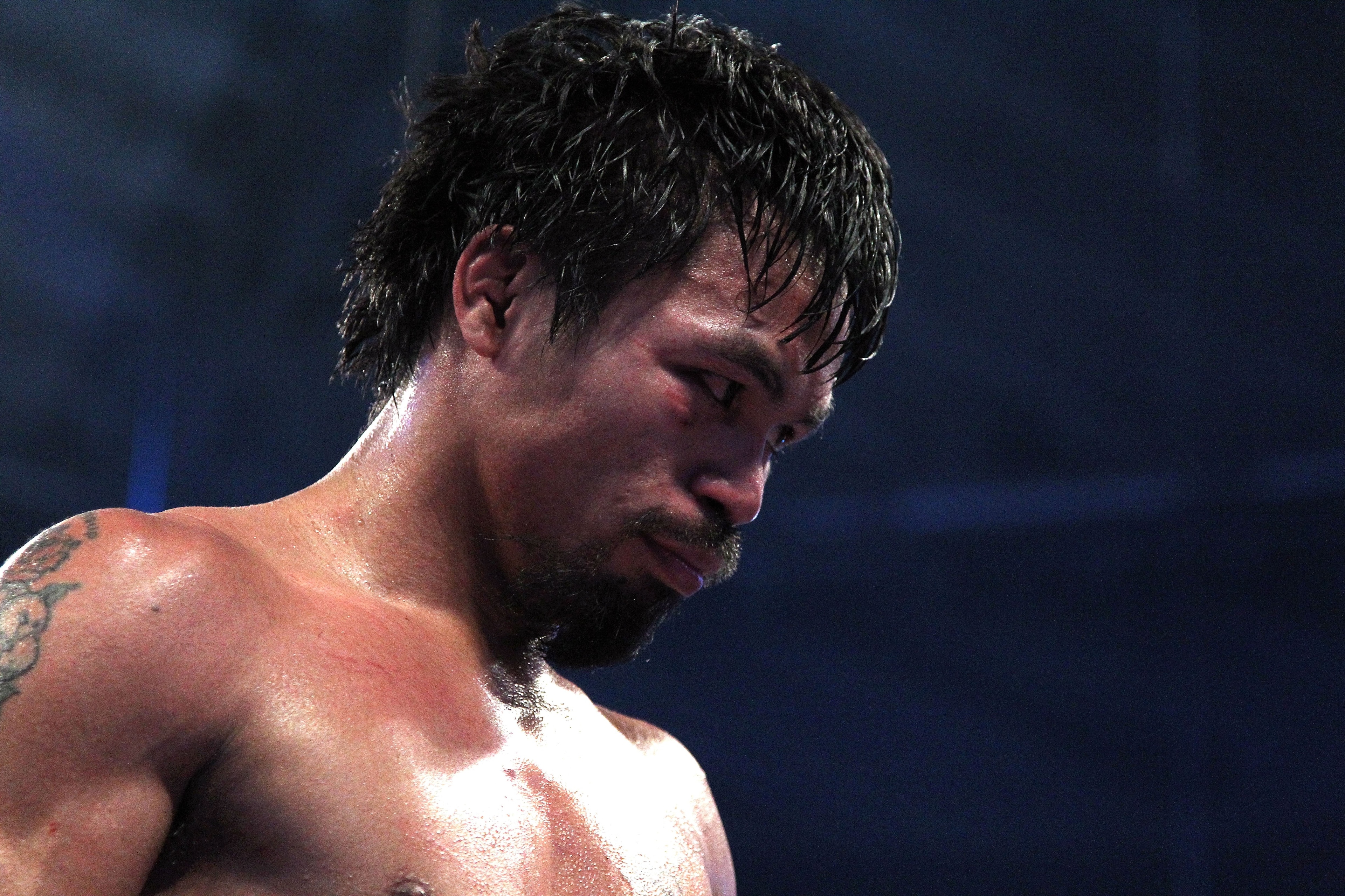 ARLINGTON, TX - MARCH 13:  Manny Pacquiao of the Philippines looks on in the ring against Joshua Clottey of Ghana during the WBO welterweight title fight at Cowboys Stadium on March 13, 2010 in Arlington, Texas. Pacquiao defeated Clottey by unanimous deci