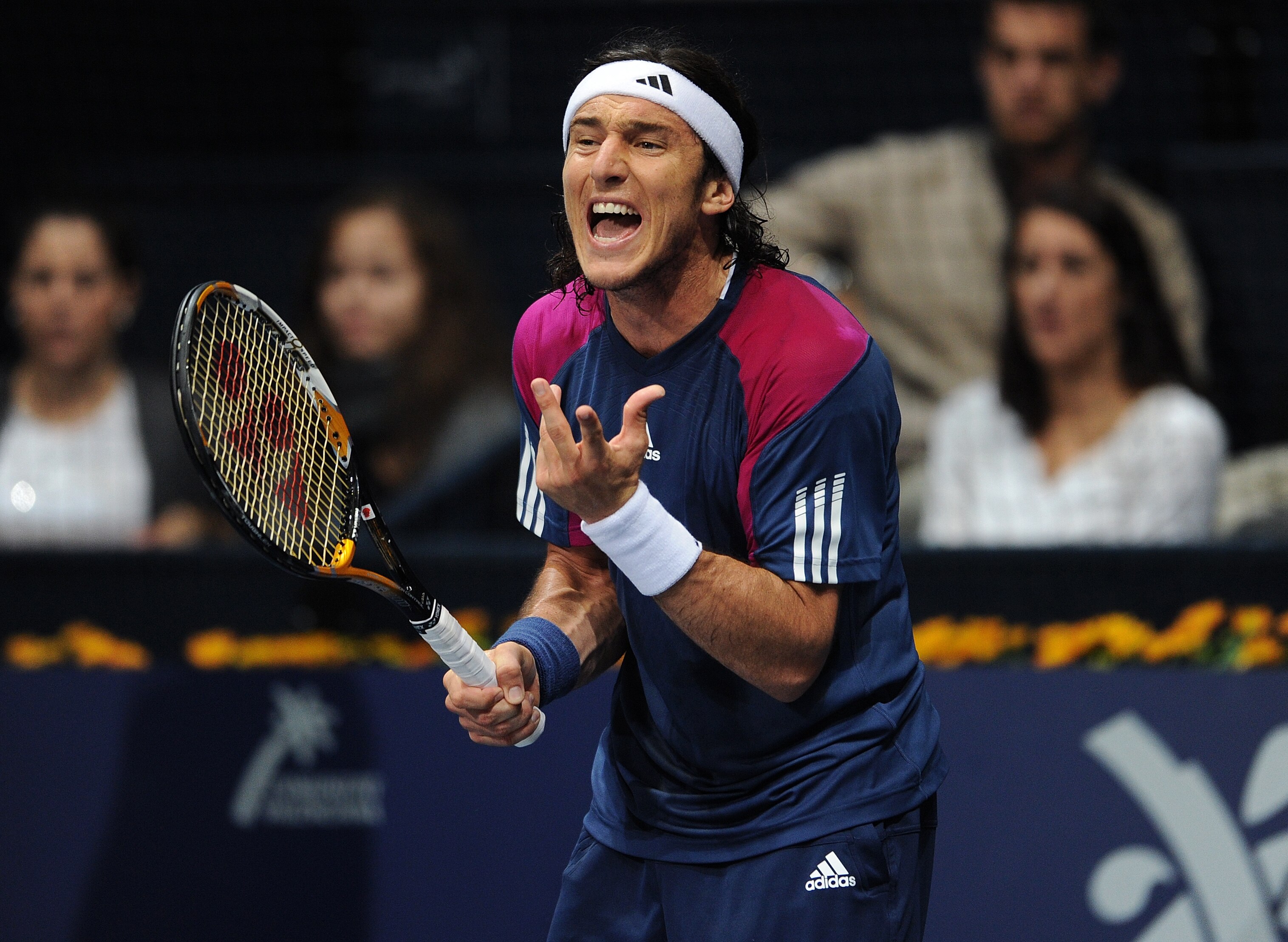 VALENCIA, SPAIN - NOVEMBER 03:  Juan Monaco of Argentina reacts in his second round match against  Andy Murray of Great Britain during the ATP 500 World Tour Valencia Open tennis tournament at the Ciudad de las Artes y las Ciencias on November 3, 2010 in