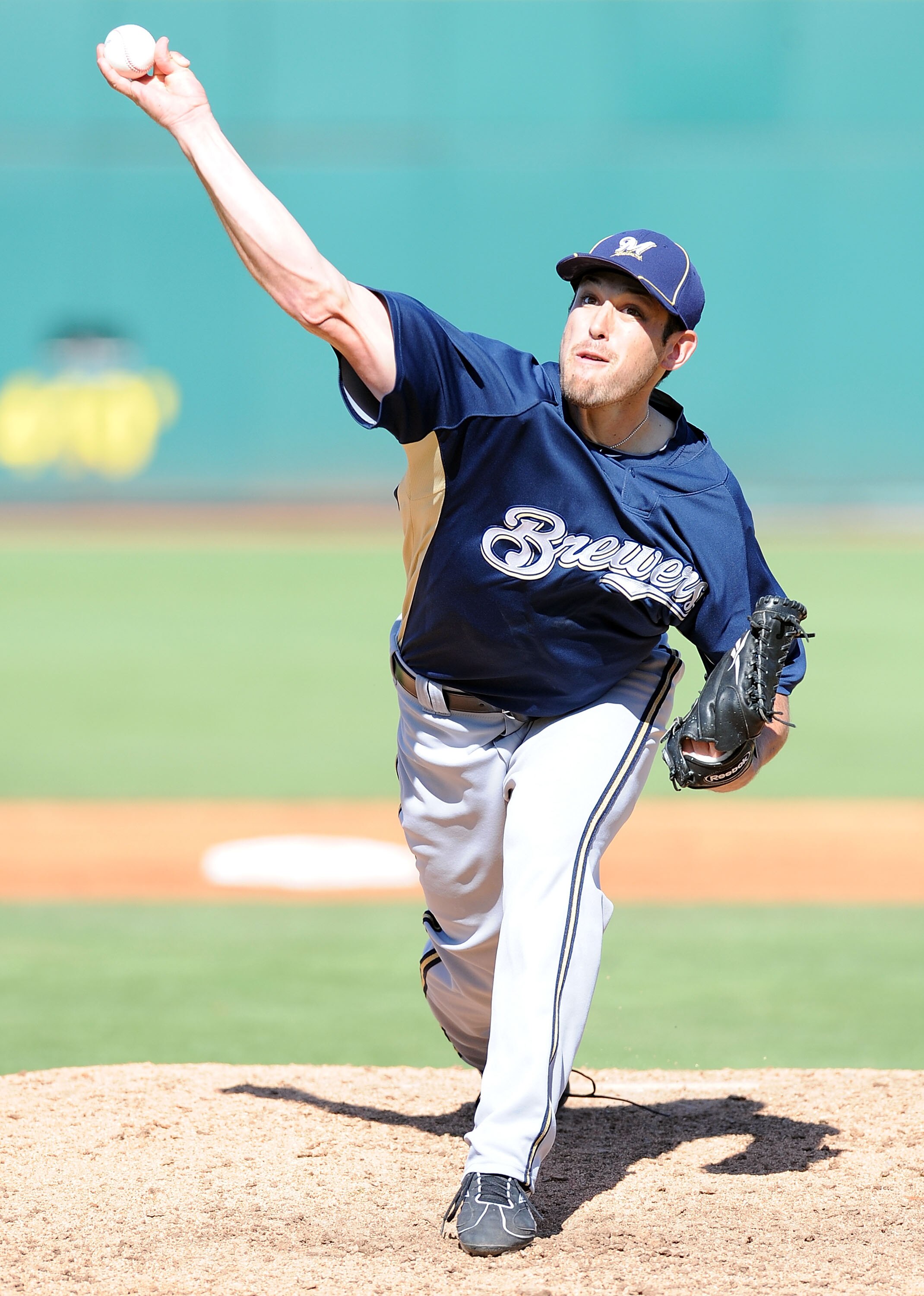 GOODYEAR, AZ - MARCH 11:   Mark Rogers #64 of the Milwaukee Brewers pitches during a Spring Training game against the Cincinnati Reds on March 11, 2010 at Goodyear Ballpark in Goodyear, Arizona.  (Photo by Lisa Blumenfeld/Getty Images)