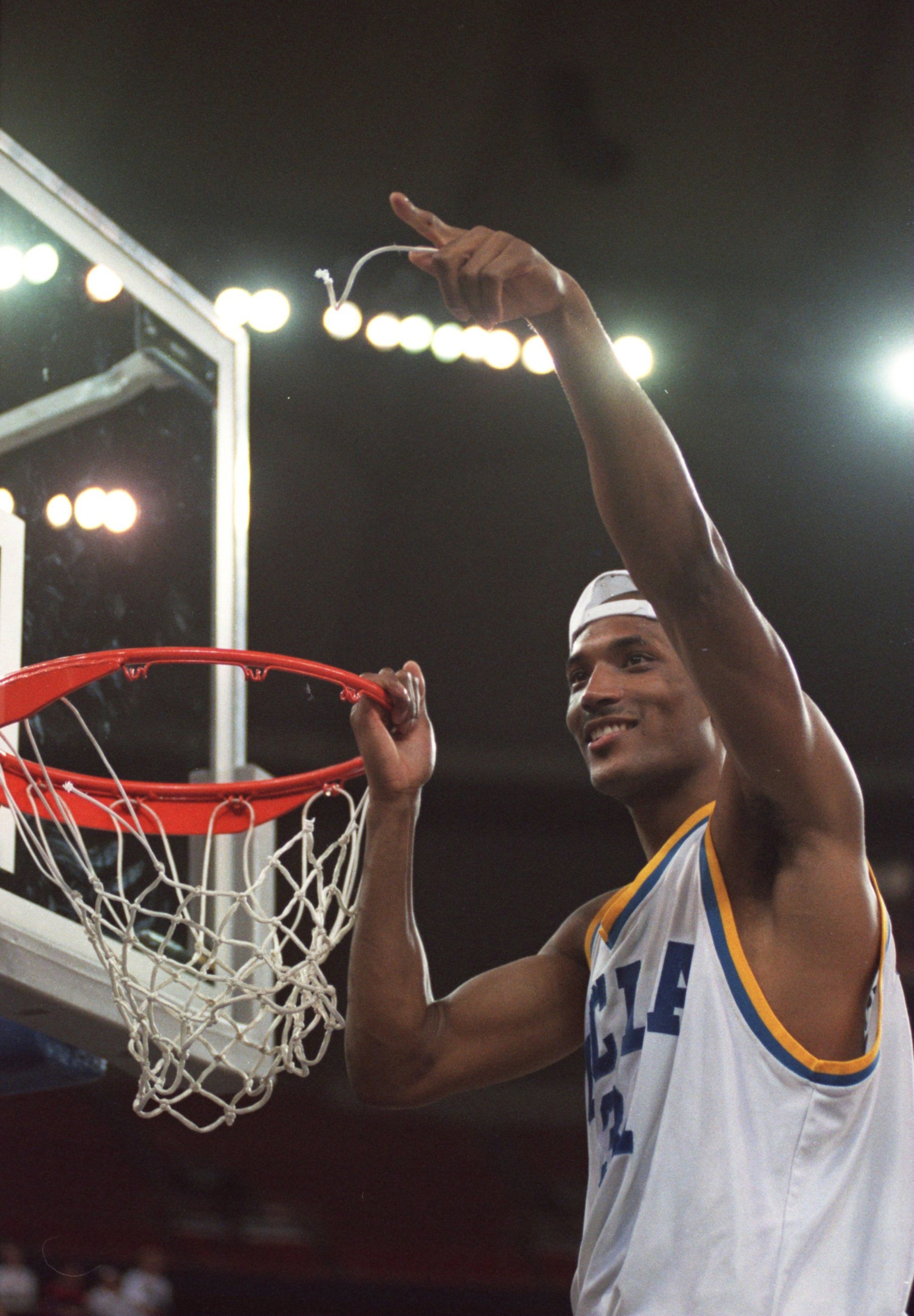 3 APR 1995: UCLA FORWARD ED O''BANNON CELEBRATES THEIR 89-78 VICTORY OVER ARKANSAS IN THE NCAA FINAL AT THE KINGDOME IN SEATTLE, WASHINGTON AS HE CUTS DOWN THE NET. Mandatory Credit: Stephen Dunn/ALLSPORT 3 APR 1995: UCLA FORWARD ED O''BANNON CELEBRATES THEIR 89-78 VICTORY OVER ARKANSAS IN THE NCAA FINAL AT THE KINGDOME IN SEATTLE, WASHINGTON AS HE CUTS DOWN THE NET. Mandatory Credit: Stephen Dunn/ALLSPORT