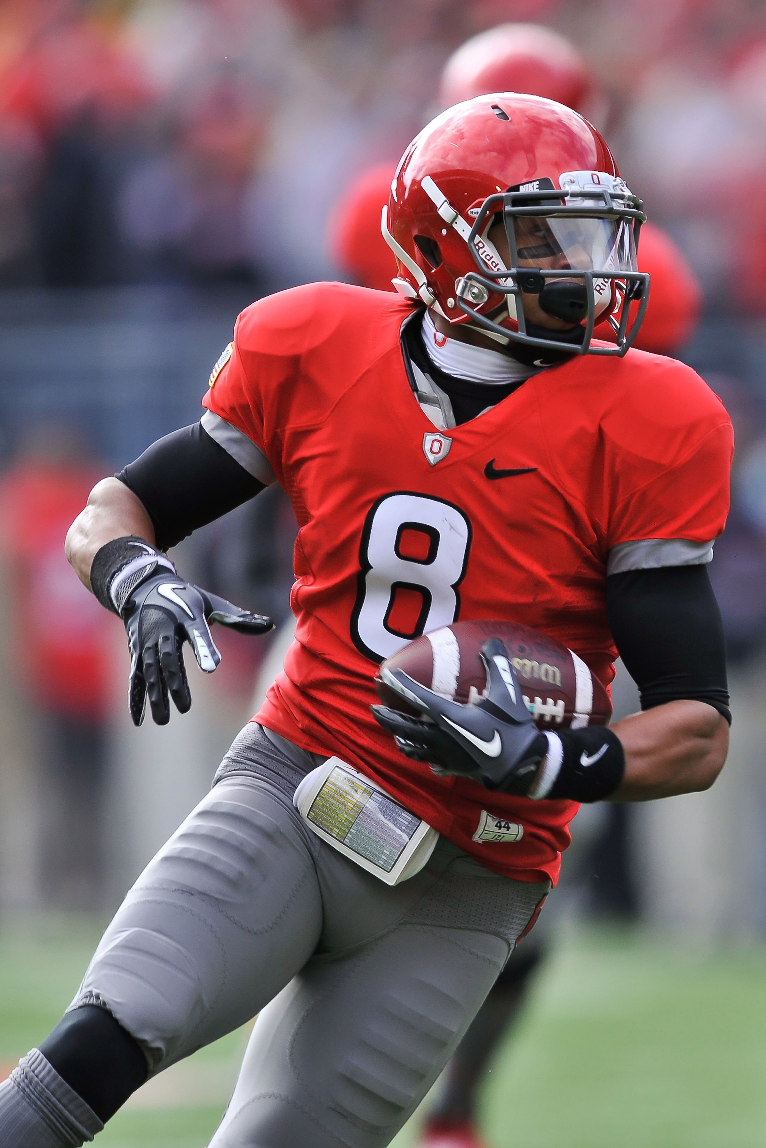 COLUMBUS, OH - NOVEMBER 27: DeVier Posey #8 of the Ohio State Buckeyes runs with the ball after a pass reception against the Michigan Wolverines at Ohio Stadium on November 27, 2010 in Columbus, Ohio. (Photo by Jamie Sabau/Getty Images) COLUMBUS, OH - NOVEMBER 27: DeVier Posey #8 of the Ohio State Buckeyes runs with the ball after a pass reception against the Michigan Wolverines at Ohio Stadium on November 27, 2010 in Columbus, Ohio. (Photo by Jamie Sabau/Getty Images)