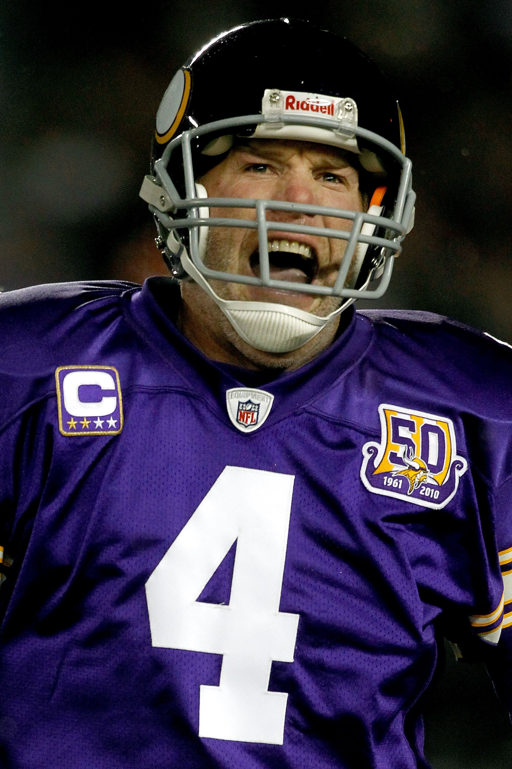 MINNEAPOLIS, MN - DECEMBER 20:  Quarterback Brett Favre of the Minnesota Vikings celebrates the Vikings first touchdown against the Chicago Bears at TCF Bank Stadium on December 20, 2010 in Minneapolis, Minnesota.  (Photo by Matthew Stockman/Getty Images)