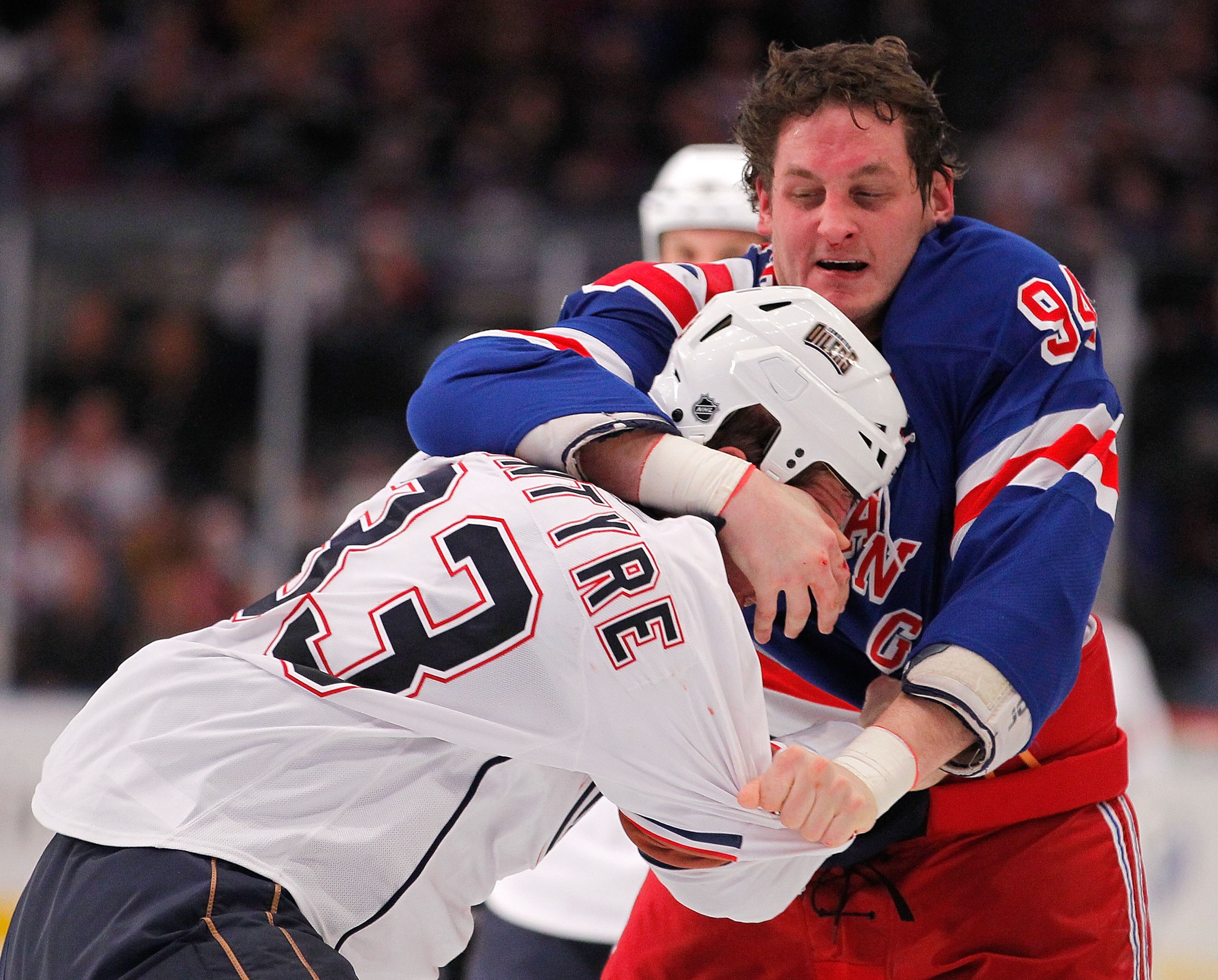 NEW YORK - NOVEMBER 14: Steve MacIntyre #33 of the Edmonton Oilers fighting with Derek Boogaard #94 of the New York Rangers during a hockey game at Madison Square Garden on November 14, 2010 in New York City. (Photo by Paul Bereswill/Getty Images) NEW YORK - NOVEMBER 14: Steve MacIntyre #33 of the Edmonton Oilers fighting with Derek Boogaard #94 of the New York Rangers during a hockey game at Madison Square Garden on November 14, 2010 in New York City. (Photo by Paul Bereswill/Getty Images)