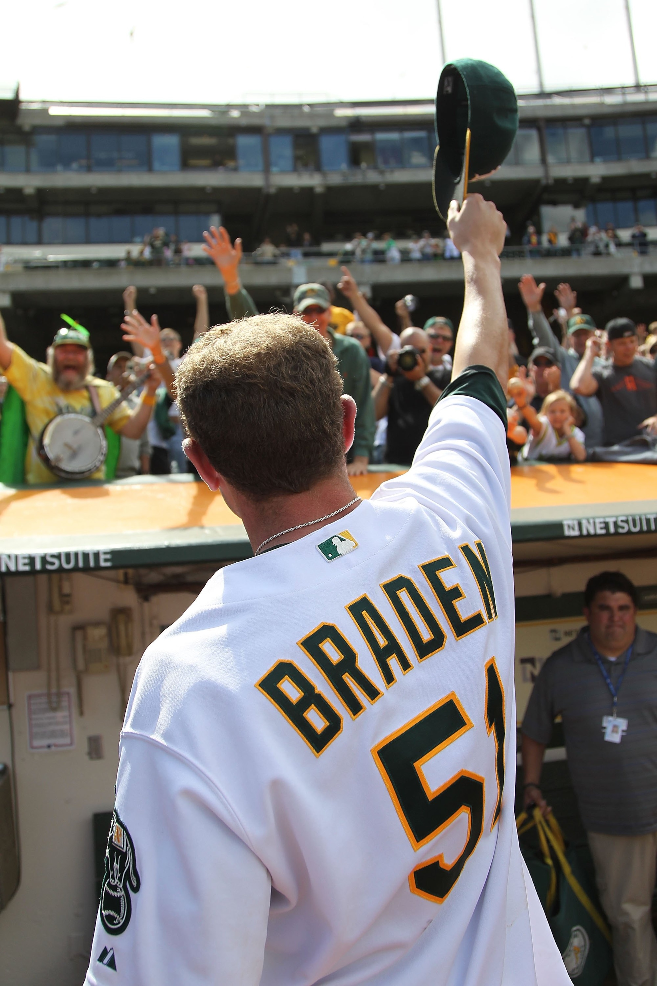 OAKLAND, CA - MAY 09:  Dallas Braden #51 of the Oakland Athletics celebrates after pitching a perfect game against the Tampa Bay Rays during an MLB game at the Oakland-Alameda County Coliseum on May 9, 2010 in Oakland, California.  (Photo by Jed Jacobsohn