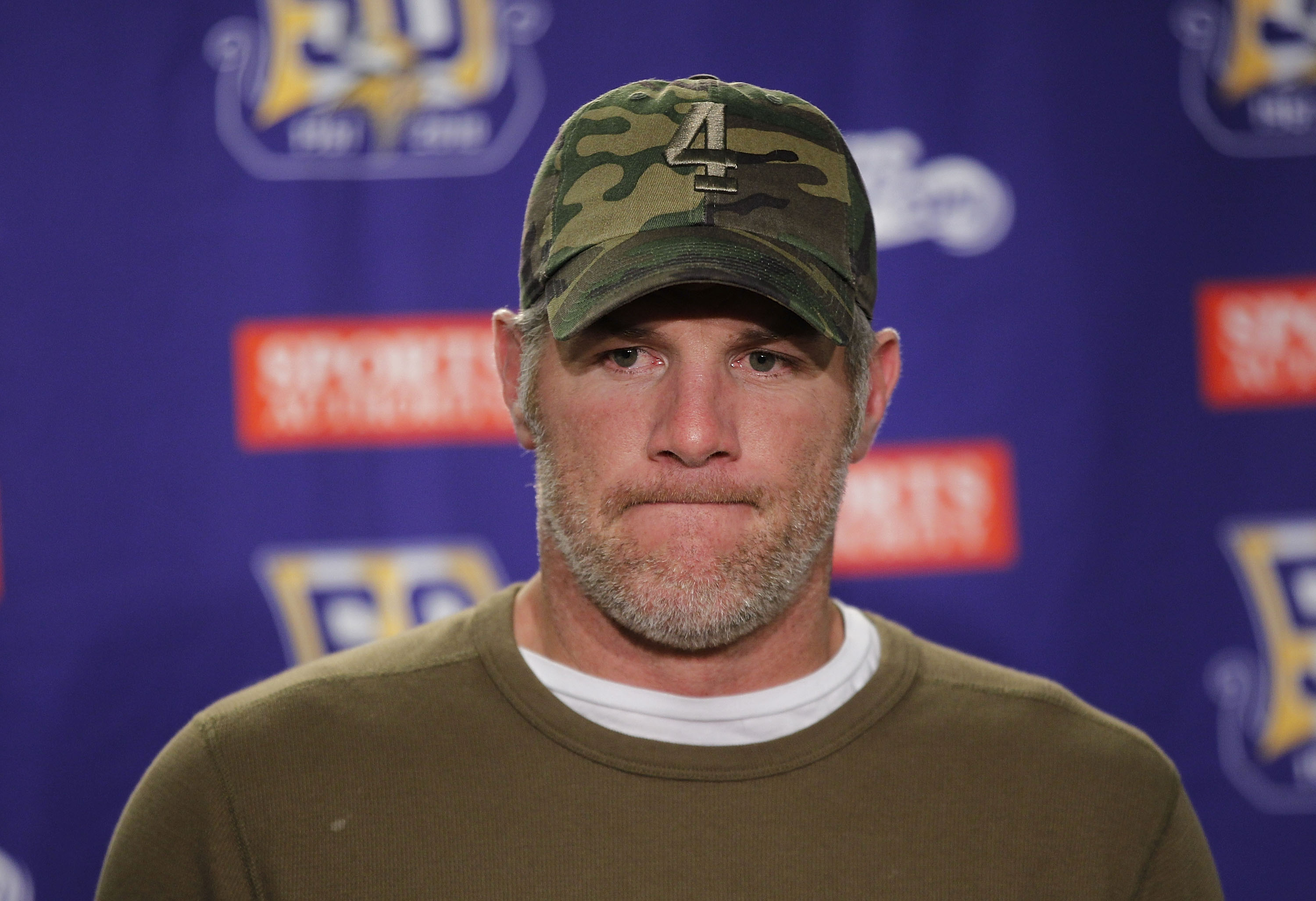 DETROIT, MI - DECEMBER 13:  Brett Favre #4 of the Minnesota Vikings talks to the media after the game against the New York Giants at Ford Field on December 13, 2010 in Detroit, Michigan. The Giants defeated the Vikings 21-3.  (Photo by Leon Halip/Getty Im