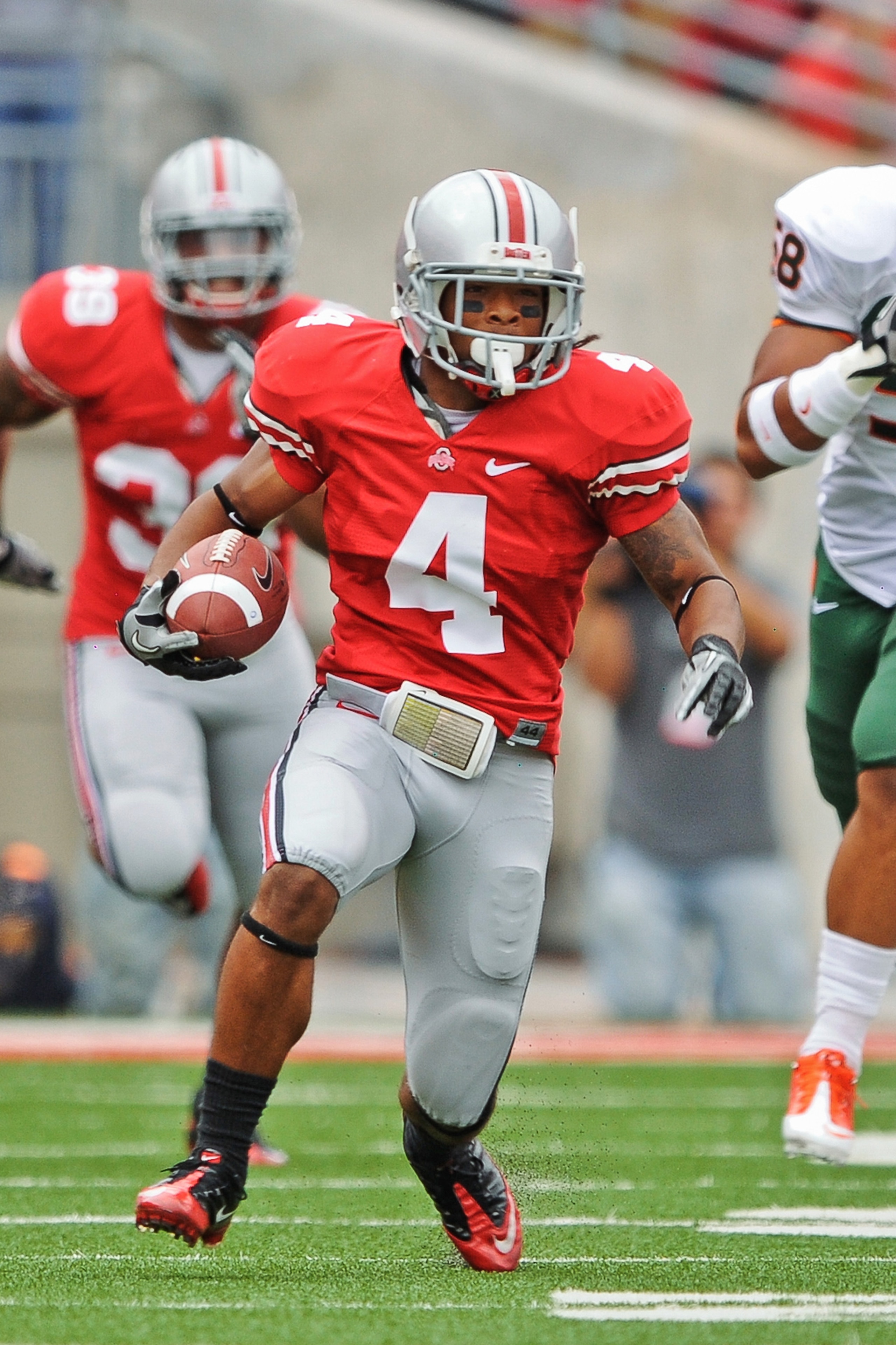 COLUMBUS, OH - SEPTEMBER 11: Jaamal Berry #4 of the Ohio State Buckeyes runs with the ball against the Miami Hurricanes at Ohio Stadium on September 11, 2010 in Columbus, Ohio. (Photo by Jamie Sabau/Getty Images) COLUMBUS, OH - SEPTEMBER 11: Jaamal Berry #4 of the Ohio State Buckeyes runs with the ball against the Miami Hurricanes at Ohio Stadium on September 11, 2010 in Columbus, Ohio. (Photo by Jamie Sabau/Getty Images)