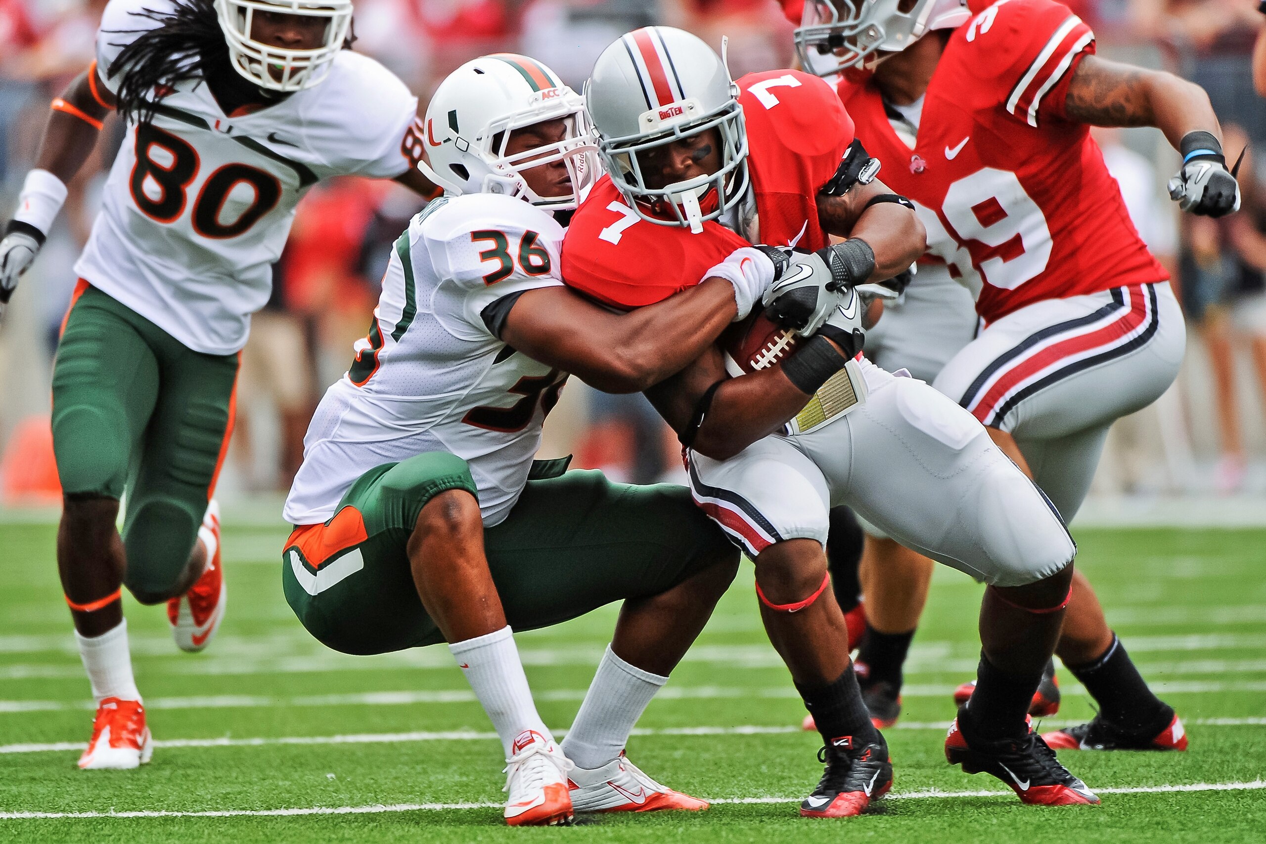 COLUMBUS, OH - SEPTEMBER 11: Kylan Robinson #36 of the Miami Hurricanes tackles Jordan Hall #7 of the Ohio State Buckeyes at Ohio Stadium on September 11, 2010 in Columbus, Ohio. (Photo by Jamie Sabau/Getty Images) COLUMBUS, OH - SEPTEMBER 11: Kylan Robinson #36 of the Miami Hurricanes tackles Jordan Hall #7 of the Ohio State Buckeyes at Ohio Stadium on September 11, 2010 in Columbus, Ohio. (Photo by Jamie Sabau/Getty Images)