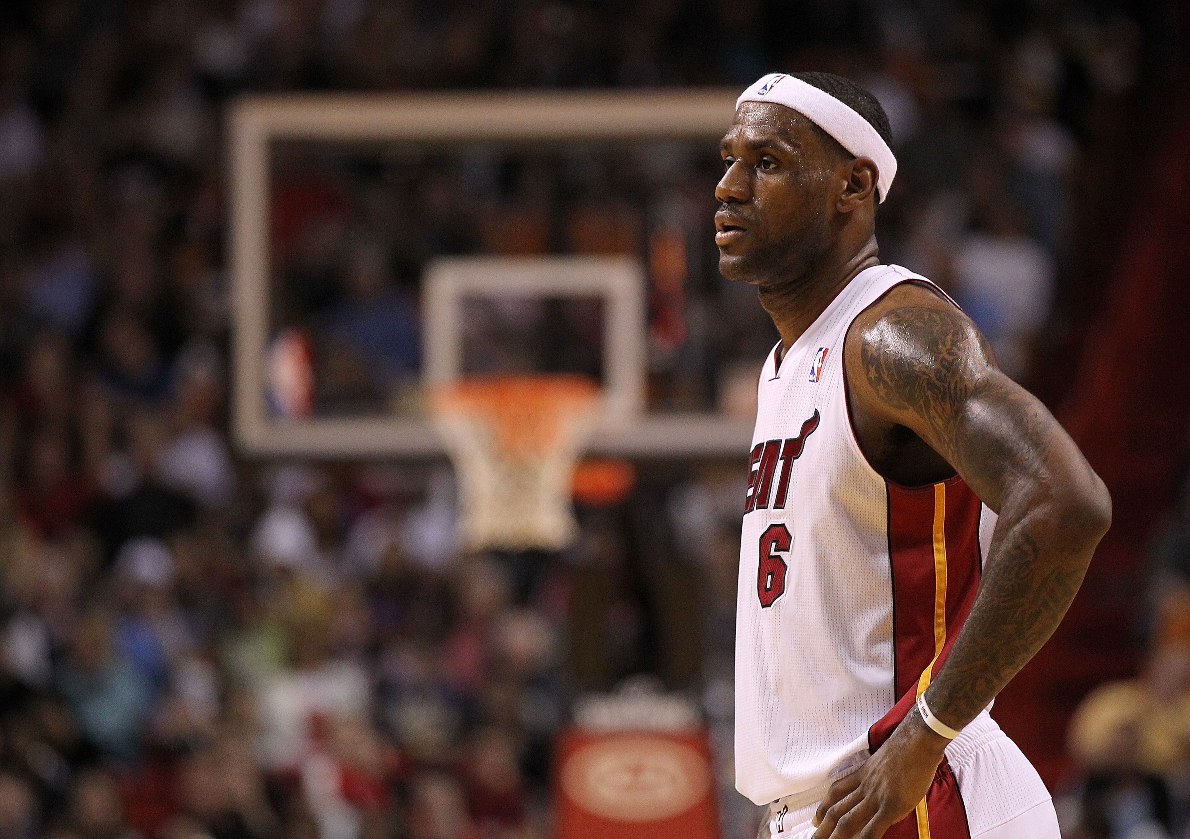 MIAMI, FL - DECEMBER 20: LeBron James #6 of the Miami Heat looks on during a game against the Dallas Mavericks at American Airlines Arena on December 20, 2010 in Miami, Florida. NOTE TO USER: User expressly acknowledges and agrees that, by downloading an MIAMI, FL - DECEMBER 20: LeBron James #6 of the Miami Heat looks on during a game against the Dallas Mavericks at American Airlines Arena on December 20, 2010 in Miami, Florida. NOTE TO USER: User expressly acknowledges and agrees that, by downloading an