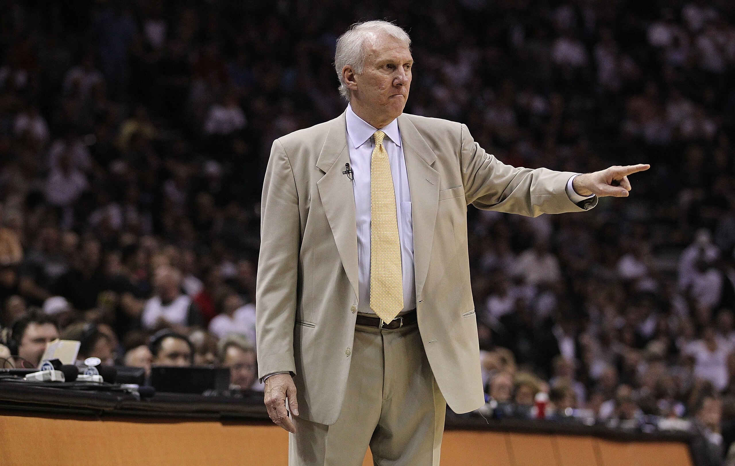 SAN ANTONIO - APRIL 29: Head coach Gregg Popovich of the San Antonio Spurs in Game Six of the Western Conference Quarterfinals during the 2010 NBA Playoffs at AT&T Center on April 29, 2010 in San Antonio, Texas. NOTE TO USER: User expressly acknowledges SAN ANTONIO - APRIL 29: Head coach Gregg Popovich of the San Antonio Spurs in Game Six of the Western Conference Quarterfinals during the 2010 NBA Playoffs at AT&T Center on April 29, 2010 in San Antonio, Texas. NOTE TO USER: User expressly acknowledges