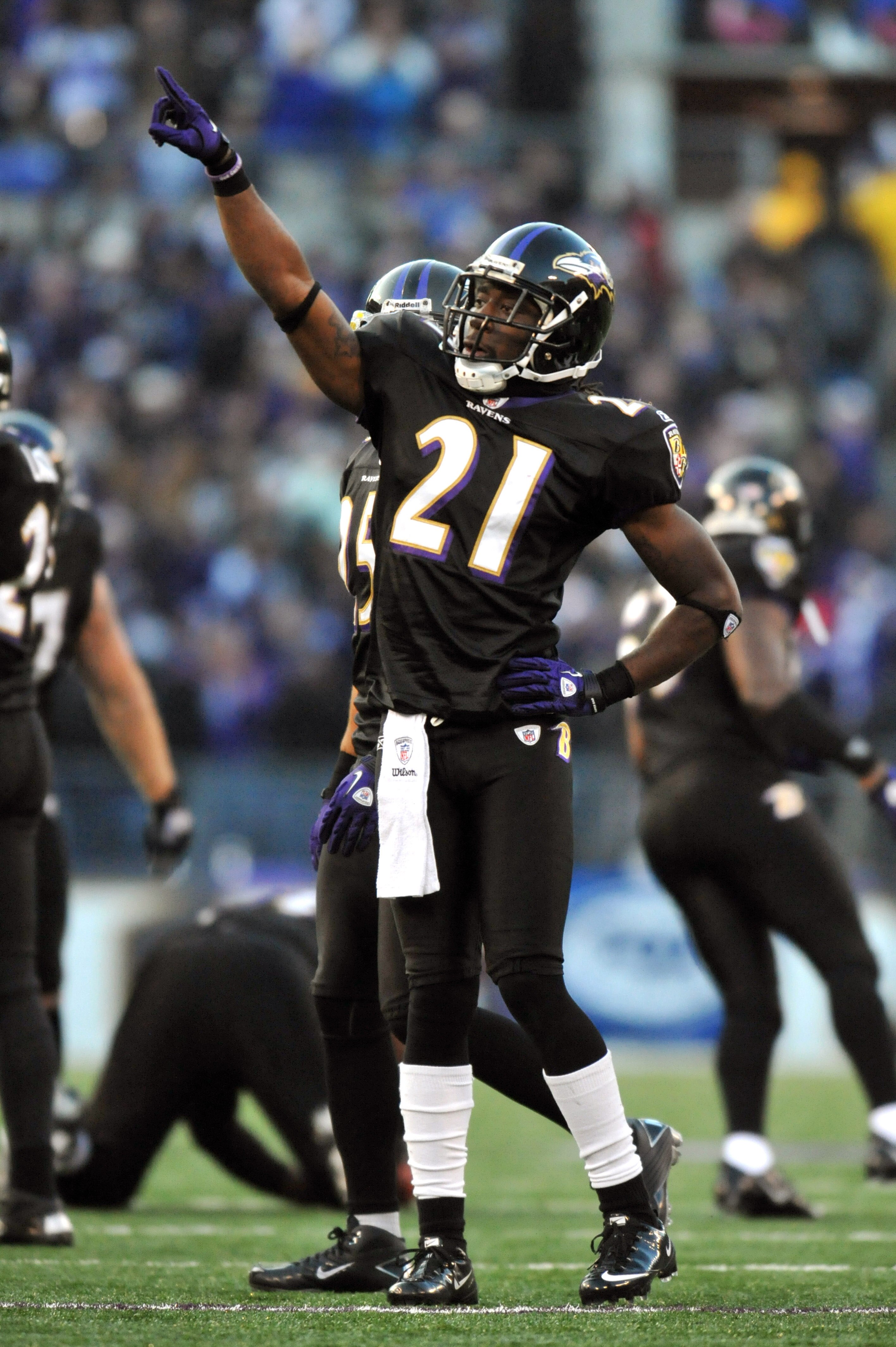 BALTIMORE, MD - DECEMBER 19:  Lardarius Webb #21 of the Baltimore Ravens celebrates Cory Redding's interception with 1 minute, 56 seconds to go in the game  against the New Orleans Saints  at M&T Bank Stadium on December 19, 2010 in Baltimore, Maryland. T
