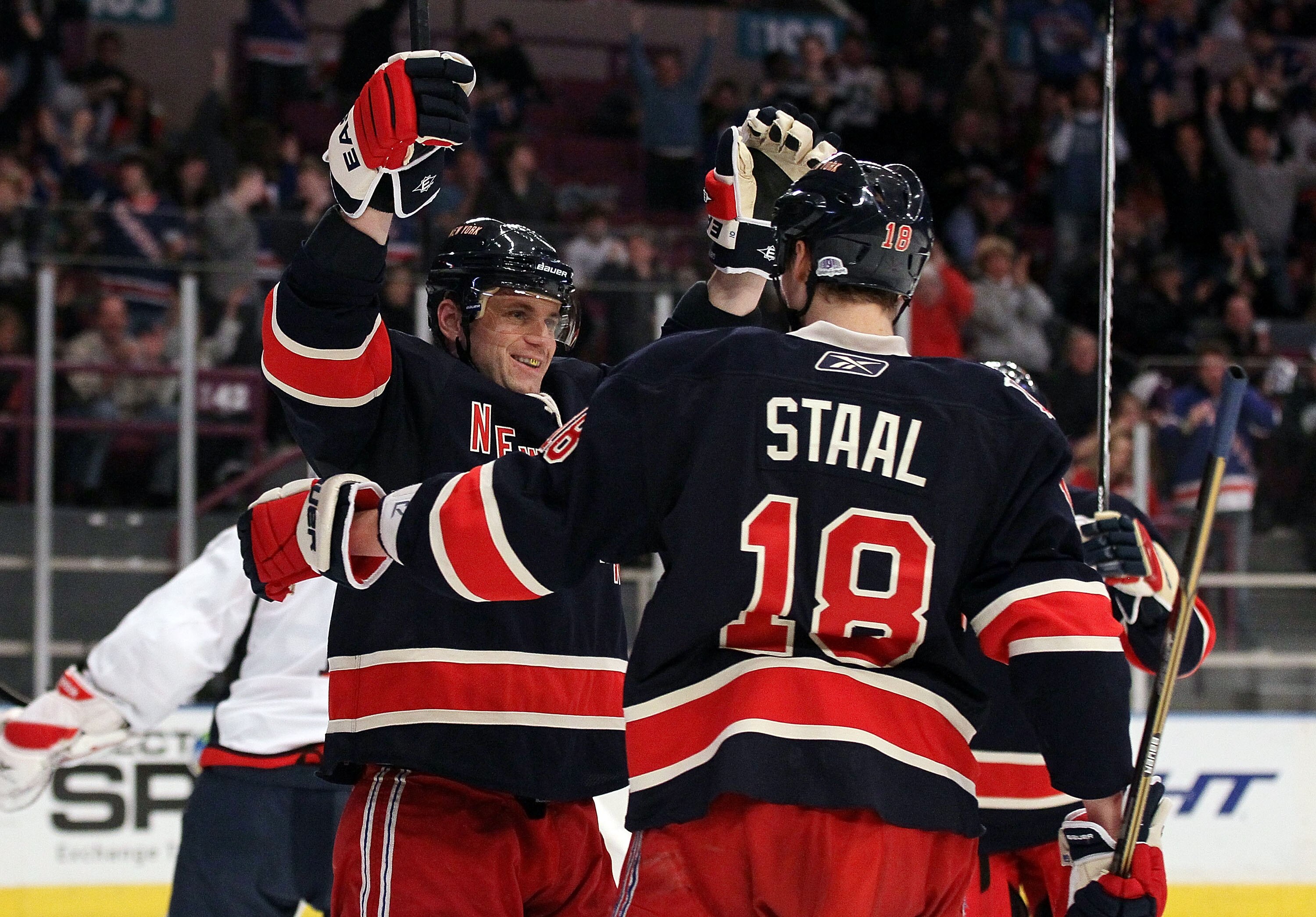 NEW YORK, NY - DECEMBER 12:  Marian Gaborik #10 of the New York Rangers celebrates his second period goal against the Washington Capitals with teammate Marc Staal #18 on December 12, 2010 at Madison Square Garden in New York City.  (Photo by Jim McIsaac/G