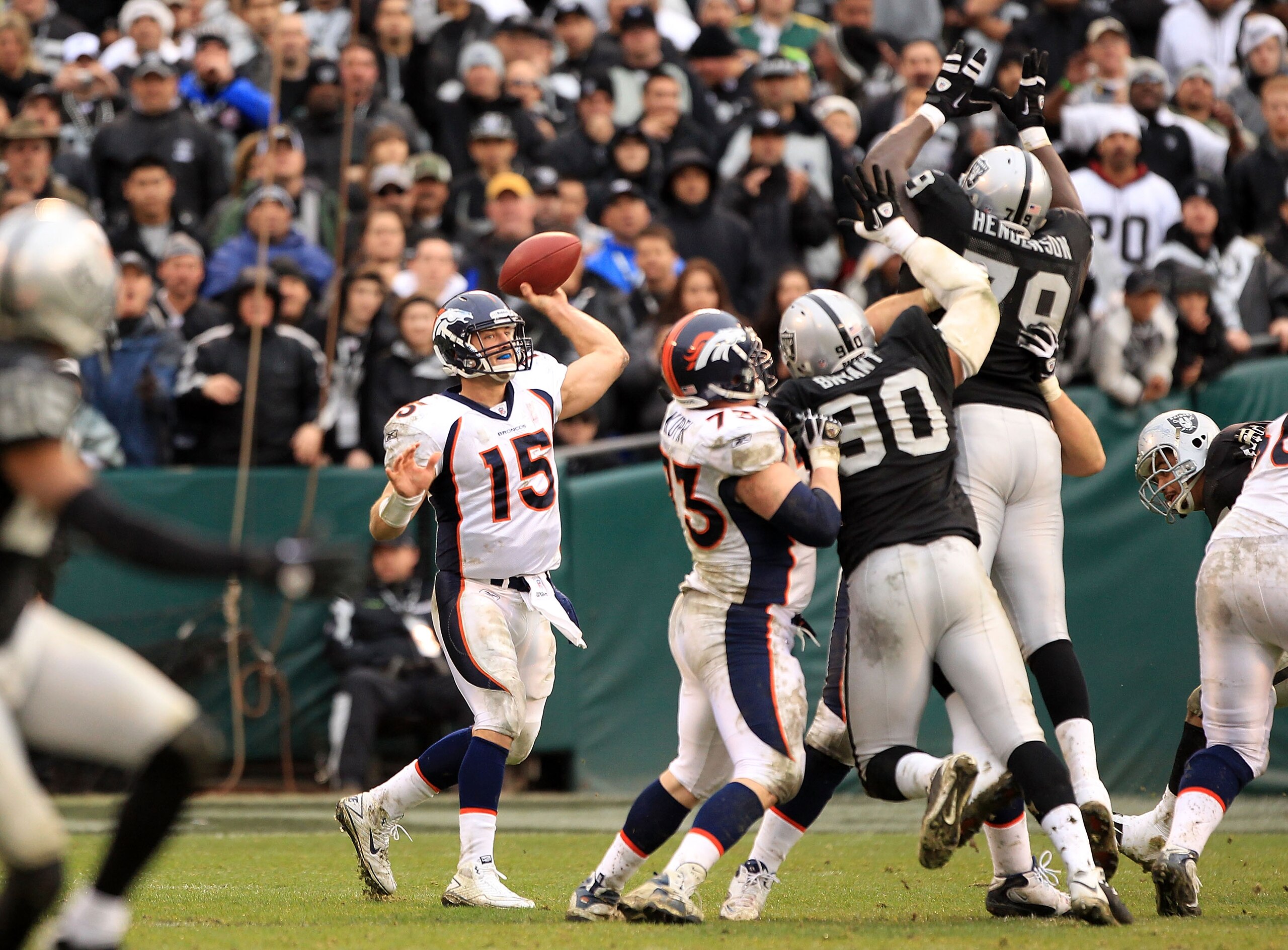 OAKLAND, CA - DECEMBER 19:  Tim Tebow #15 of the Denver Broncos in action during their game against the Oakland Raiders at Oakland-Alameda County Coliseum on December 19, 2010 in Oakland, California.  (Photo by Ezra Shaw/Getty Images)