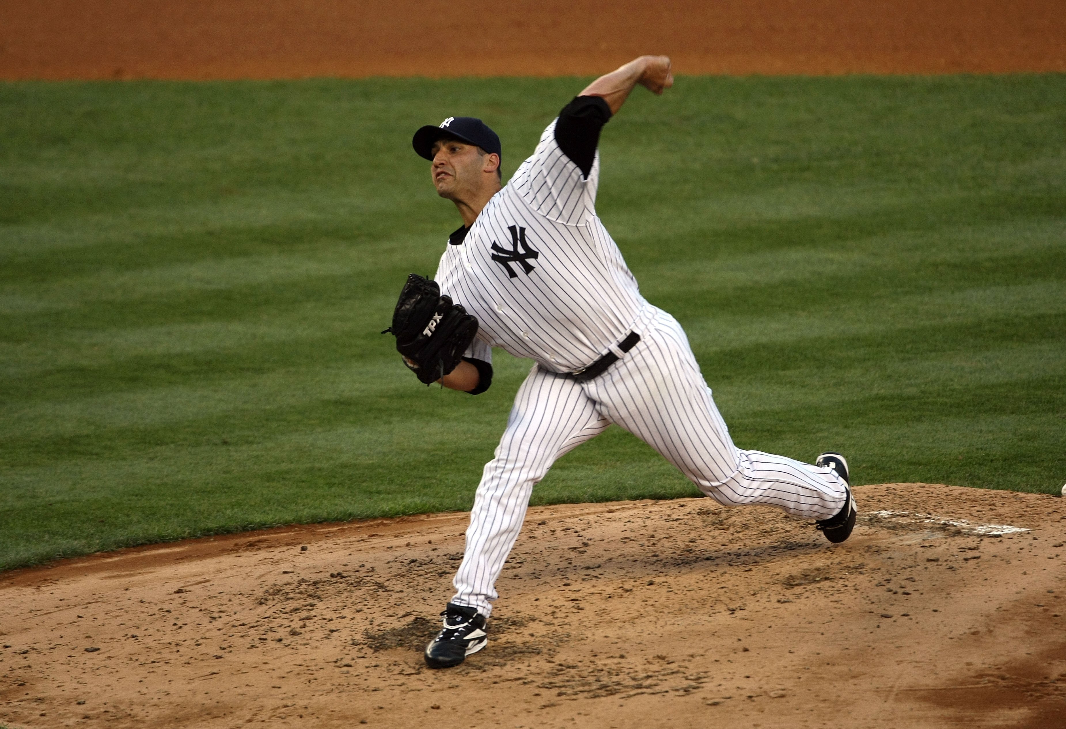 NEW YORK - JULY 8:  Andy Pettite #46 of the New York Yankees delivers a pitch during their MLB game against the Tampa Bay Rays on July 8, 2008 at Yankee Stadium in the Bronx borough of New York City. The Yankees defeated the Rays 5-0. (Photo by Chris McGr
