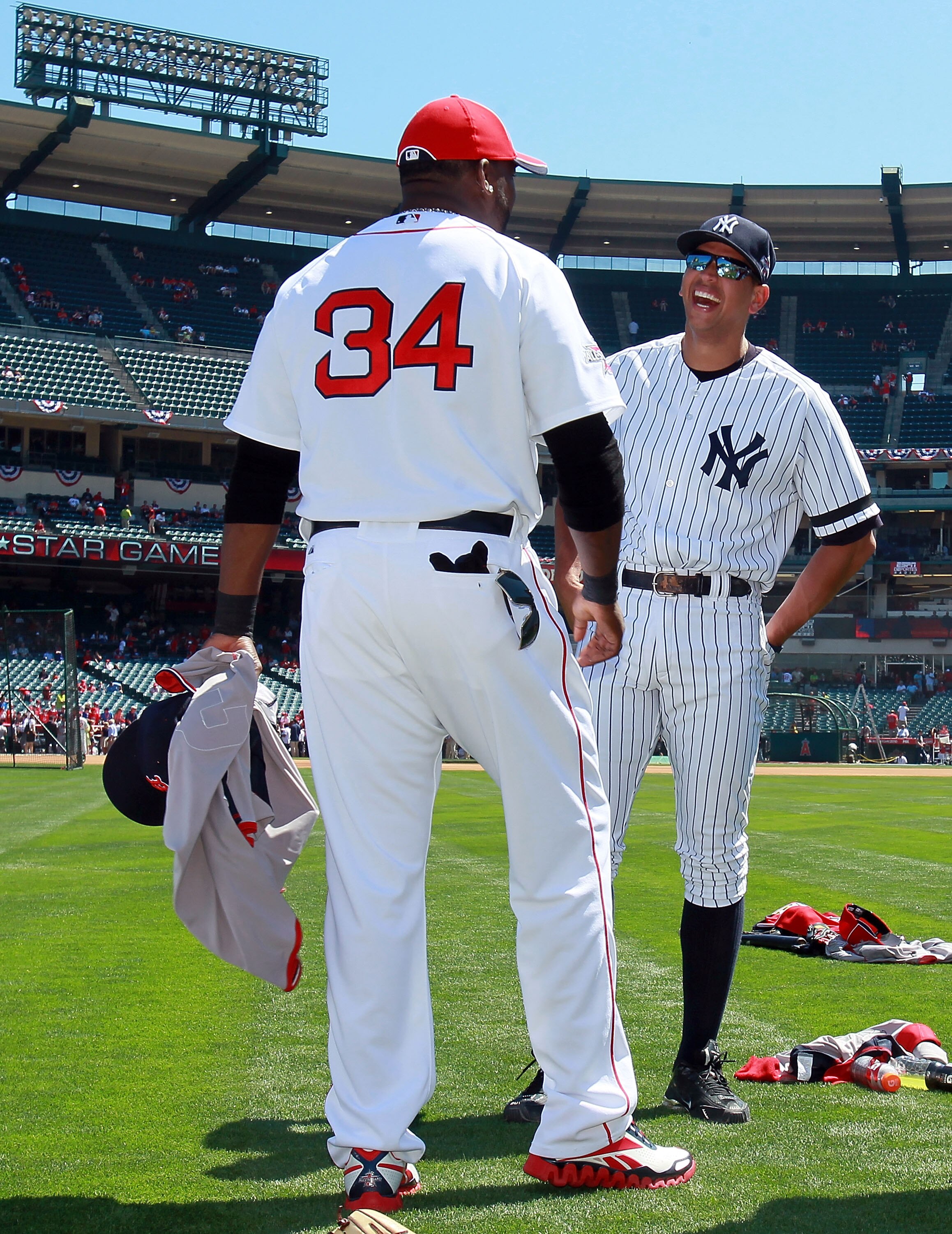 ANAHEIM, CA - JULY 13:  ANAHEIM, CA - JULY 1American League All-Star David Ortiz #34 of the Boston Red Sox  and American League All-Star Alex Rodriguez #13 of the New York Yankees talk before the 81st MLB All-Star Game at Angel Stadium of Anaheim on July